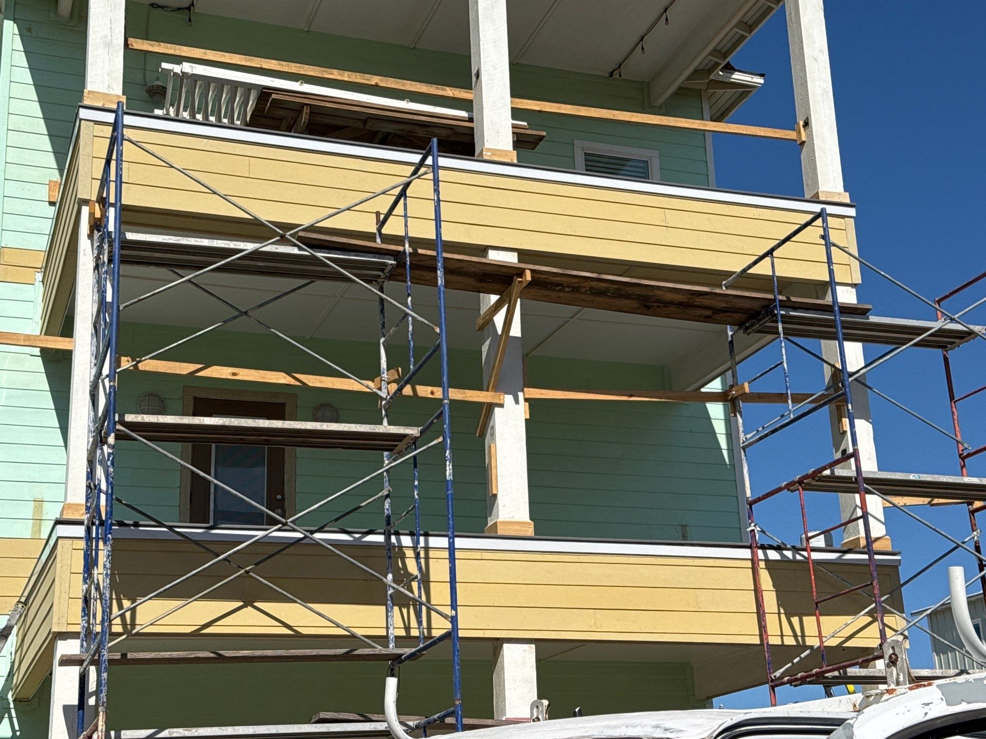 Walk Out Patio Cover by Bayfront Roofing and Construction