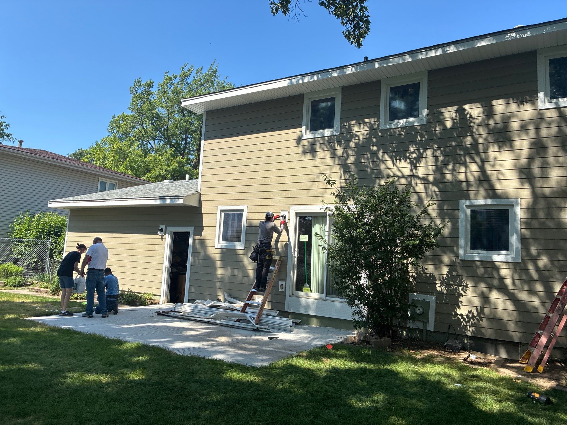 Full James Hardie Siding Replacement and Custom Exterior Paint in Papillion by Carps Complete Exteriors 
