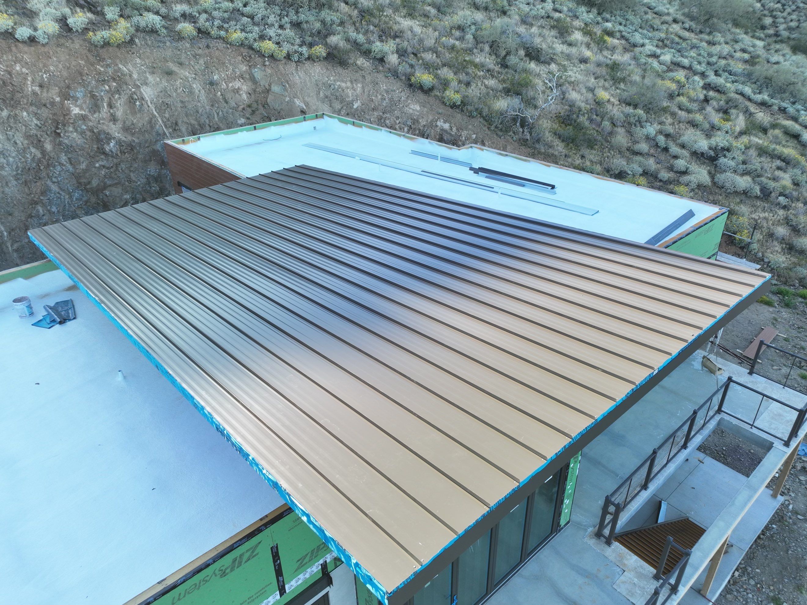 Dark Bronze Standing Seam by Reimagine Roofing