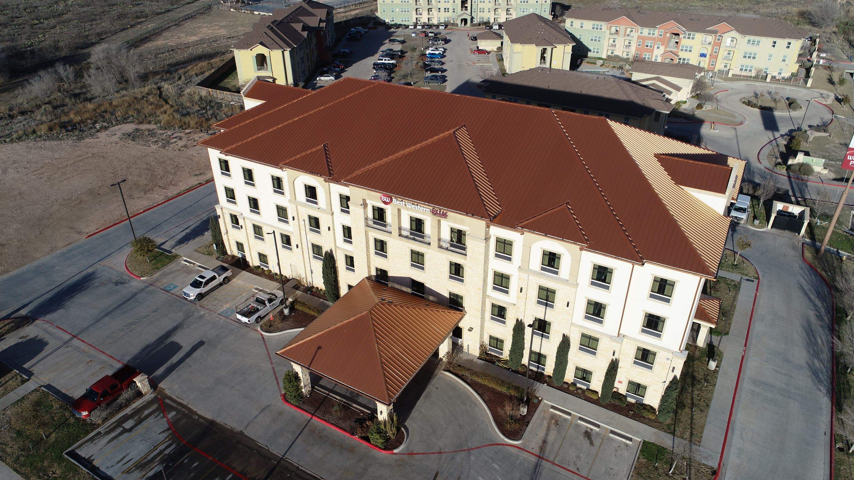 Commercial Roof Replacement for Best Western using Standing Seam Roofing - Midland, TX by Roof Experts