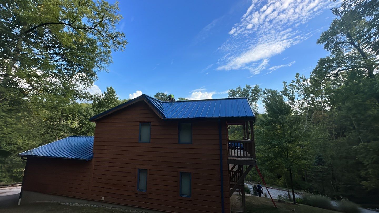 Residential Roofing Installation using Standing Seam Metal - Gallery Blue by RoofX 