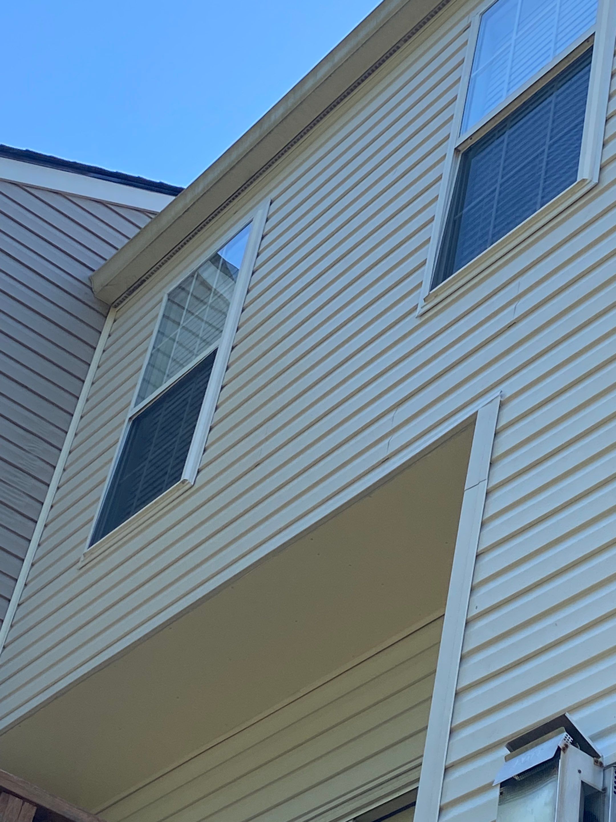Woodbridge: Siding Replacement with Mastic Ovation Vinyl siding in Linen  by RM Banning, Inc.
