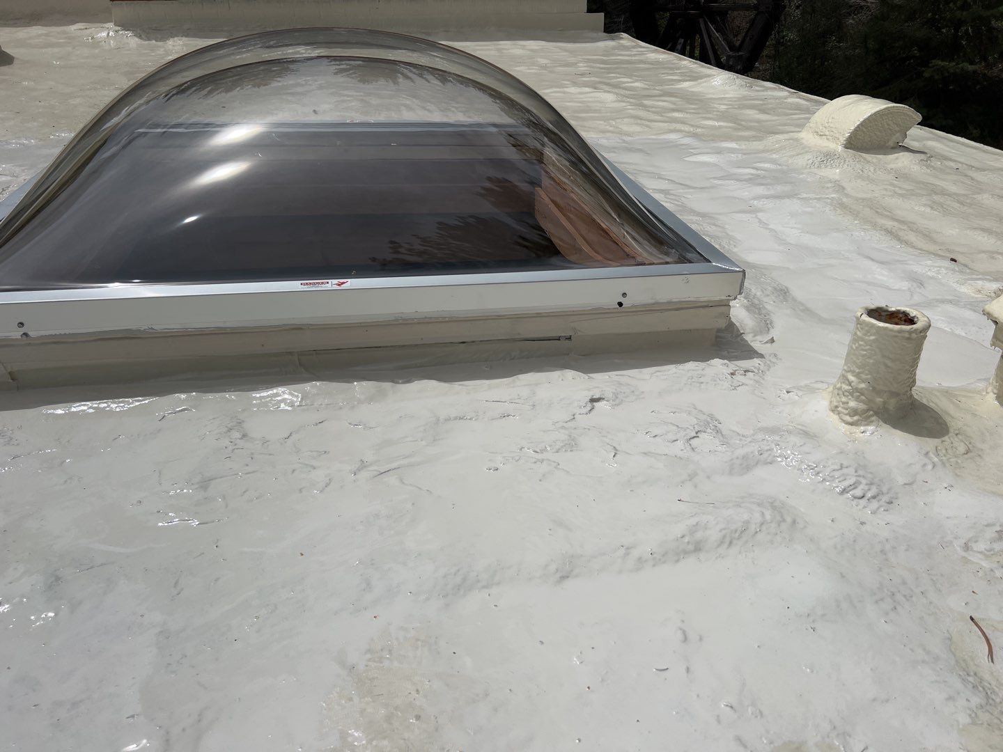 Commercial Roofing Installation using CASTAGRA ECODUR COATING by A to Z Roofing
