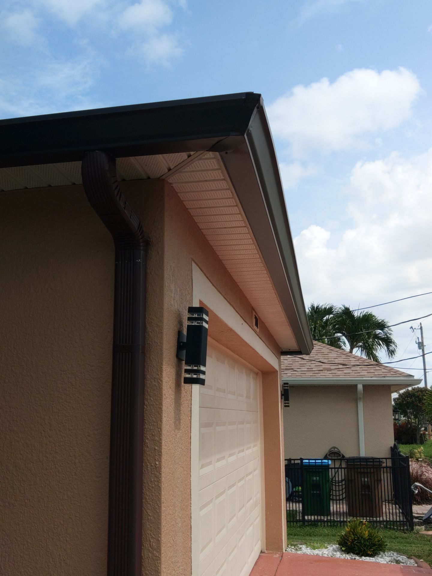 Downspout Installation for Multi-Story Homes in Cape Coral FL by Gutter Professors