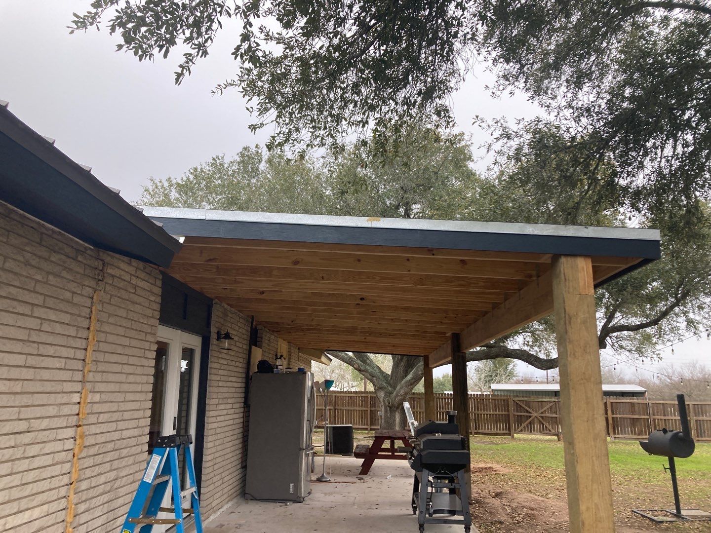Beeville Backporch sittin' by Bayfront Roofing and Construction