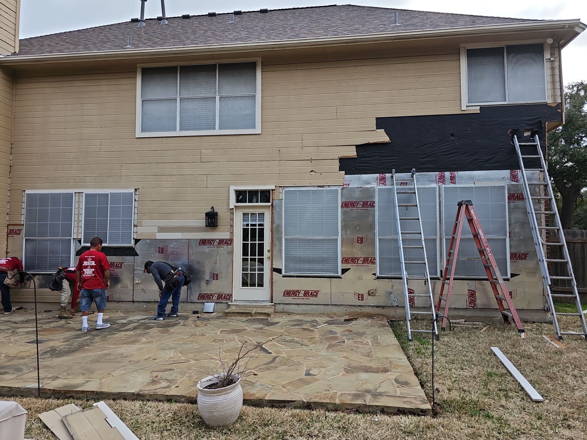 New Hardie Lap Siding & Board and Batten by DeZign Roofing & Exteriors