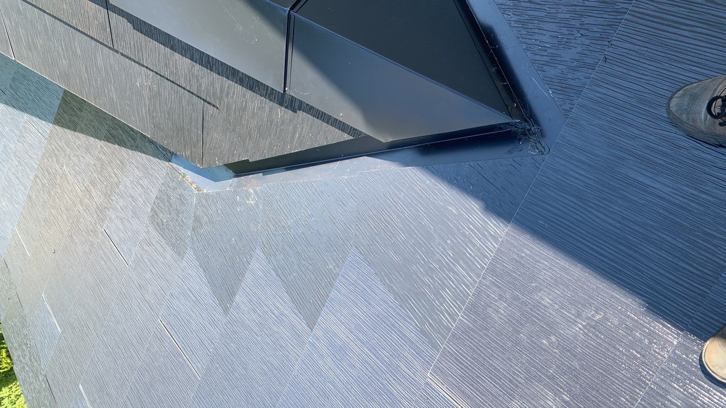 Tesla Solar Roof Replacement using Tesla Solar Roof V3 tiles by American Home Contractors