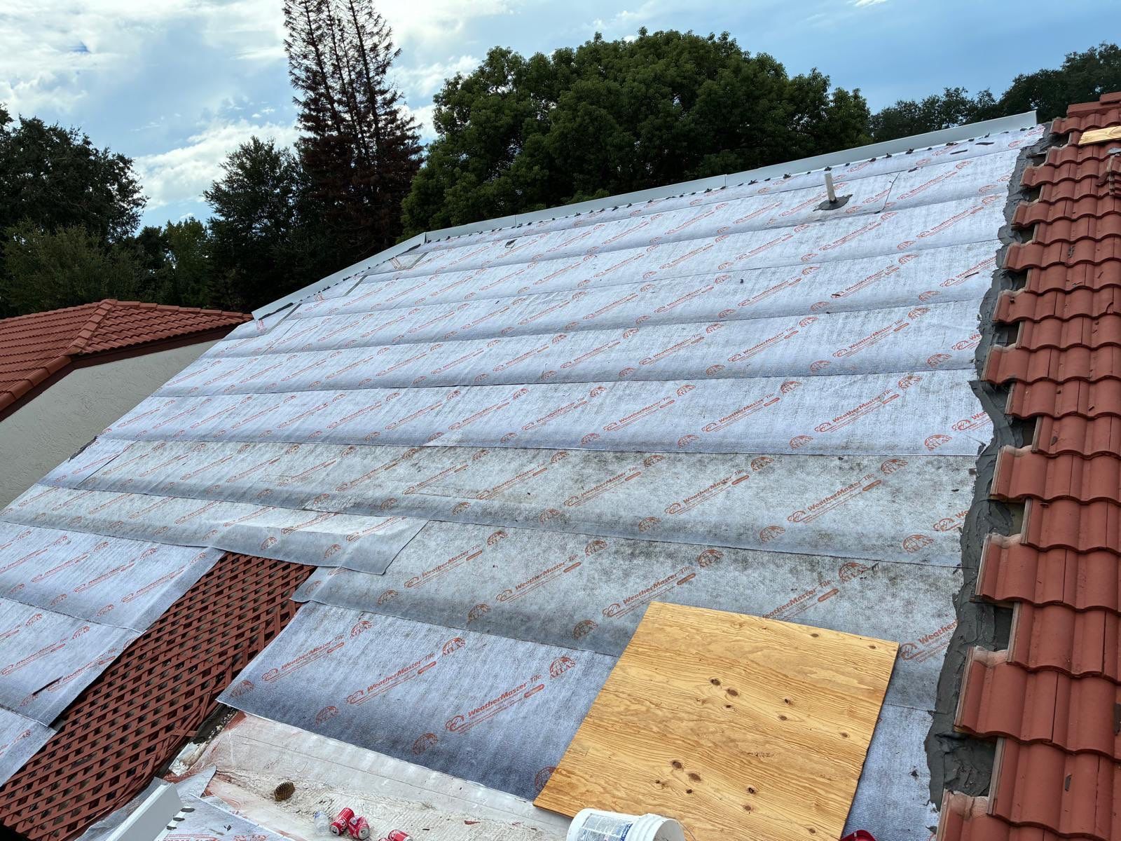 Residential Tile Roof Replacement and Gutter Installation in Winter Park by Pinnacle Roofing Group