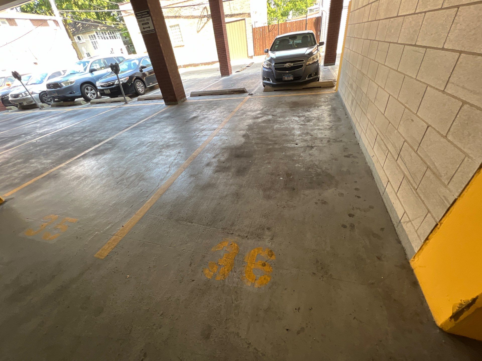 Parking garage using Hot water by Northern Power Washing LLC.