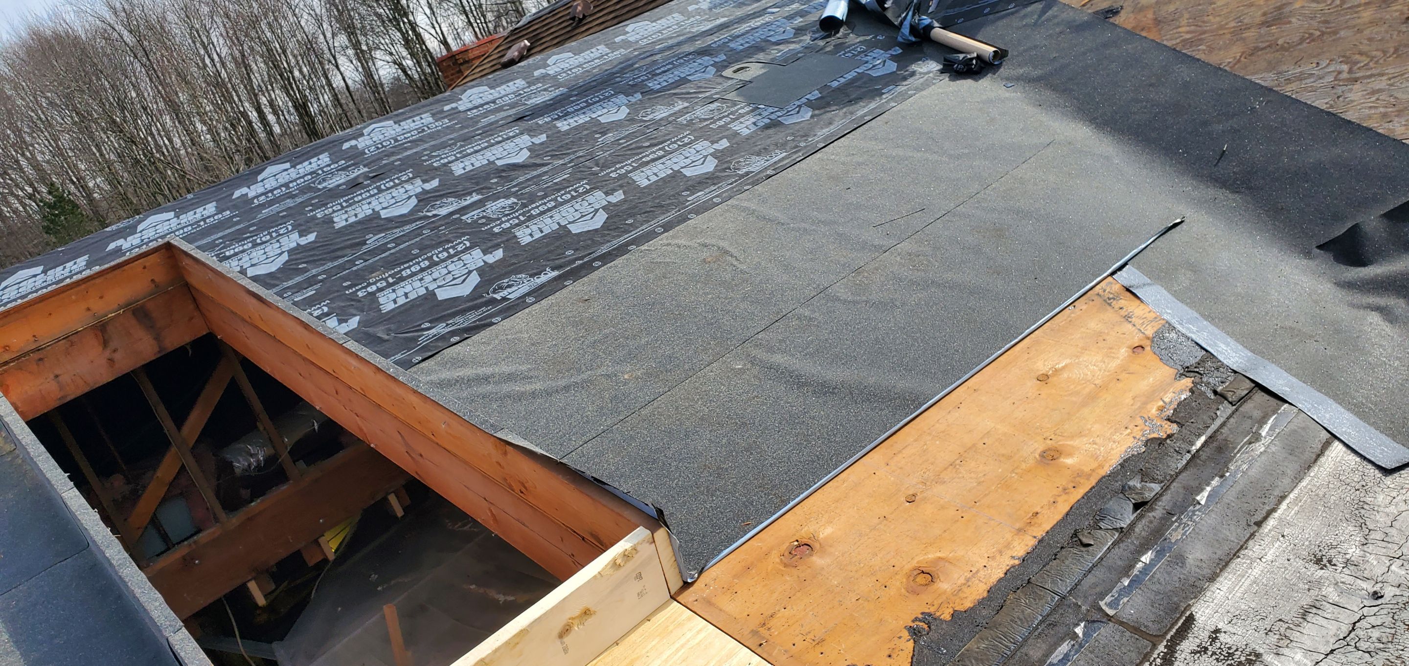 Skylight removal and install  by Absolute Roofing and Construction