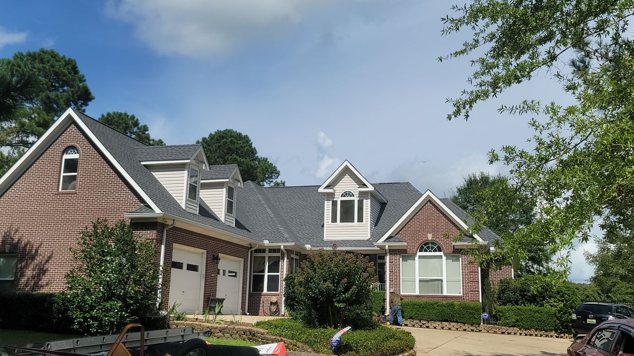 Residential Roofing Installation using Roof Replacement by American Roofing & Construction LLC
