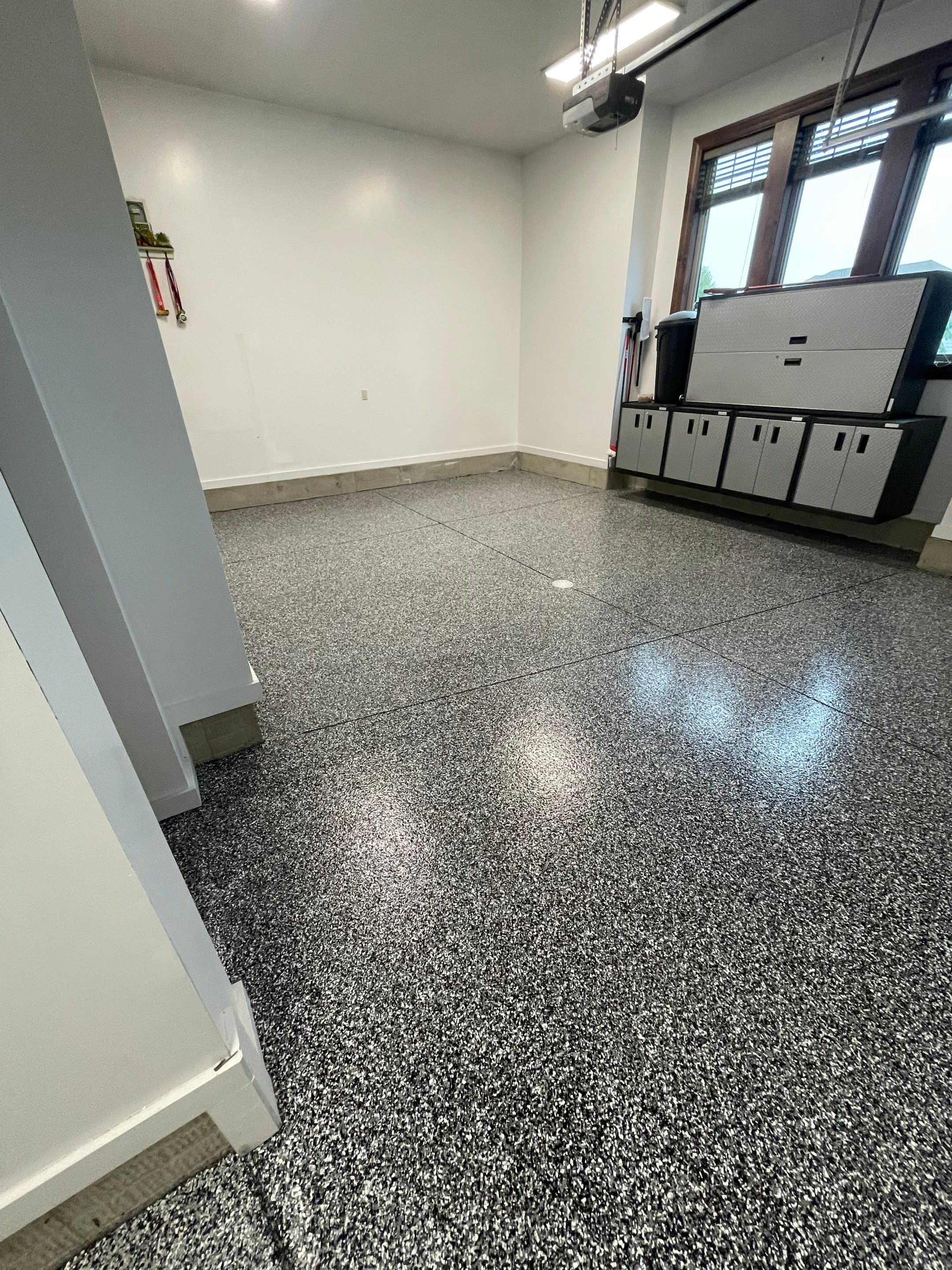 Garage Floor Coating and Domino Flake Finish in Sioux Falls by Select Painting, Coatings & Garage Cabinets