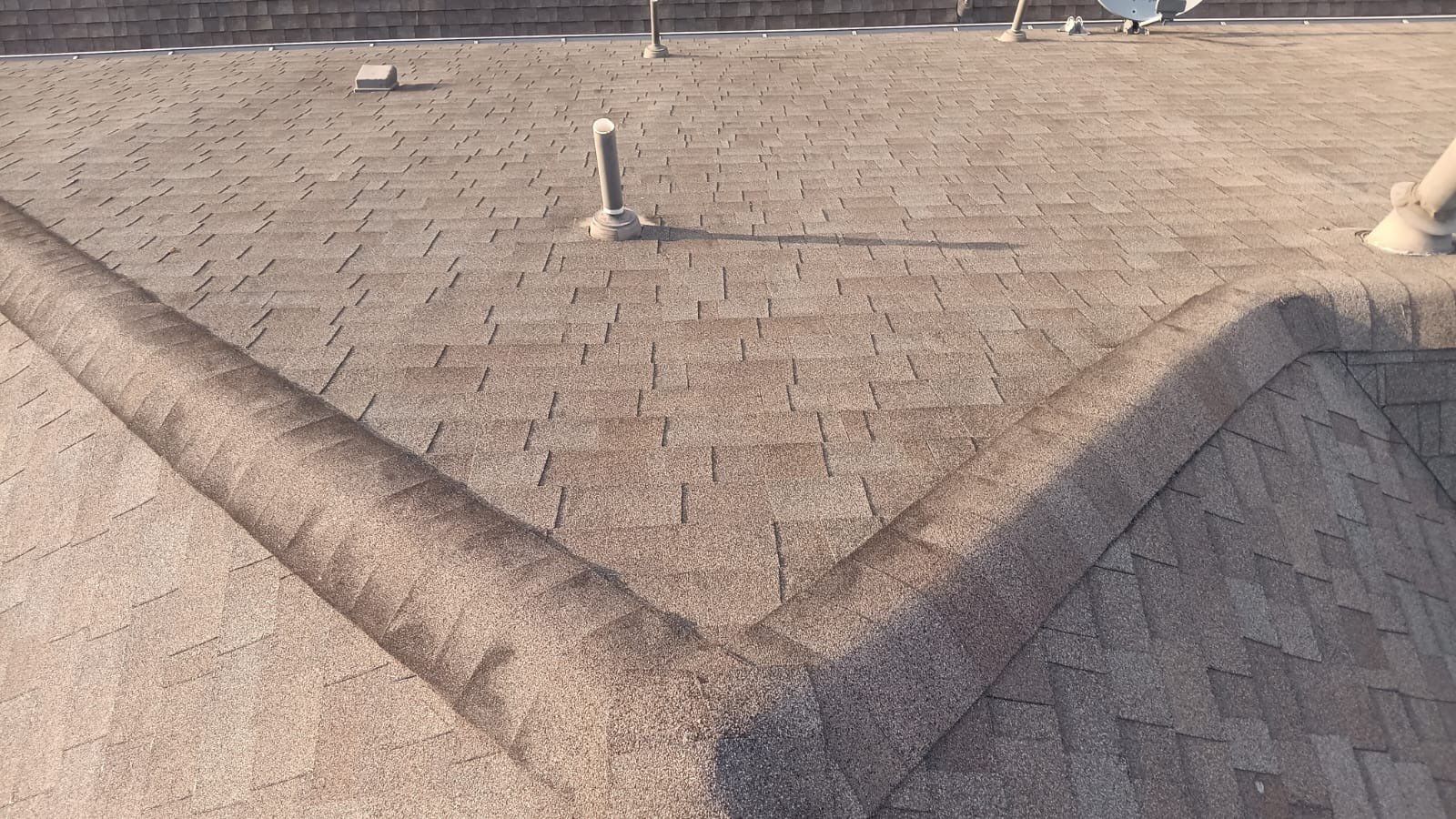 Hail Damage using Owen's Corning Duration (Lifetime) Shingles by Roof Repair Company