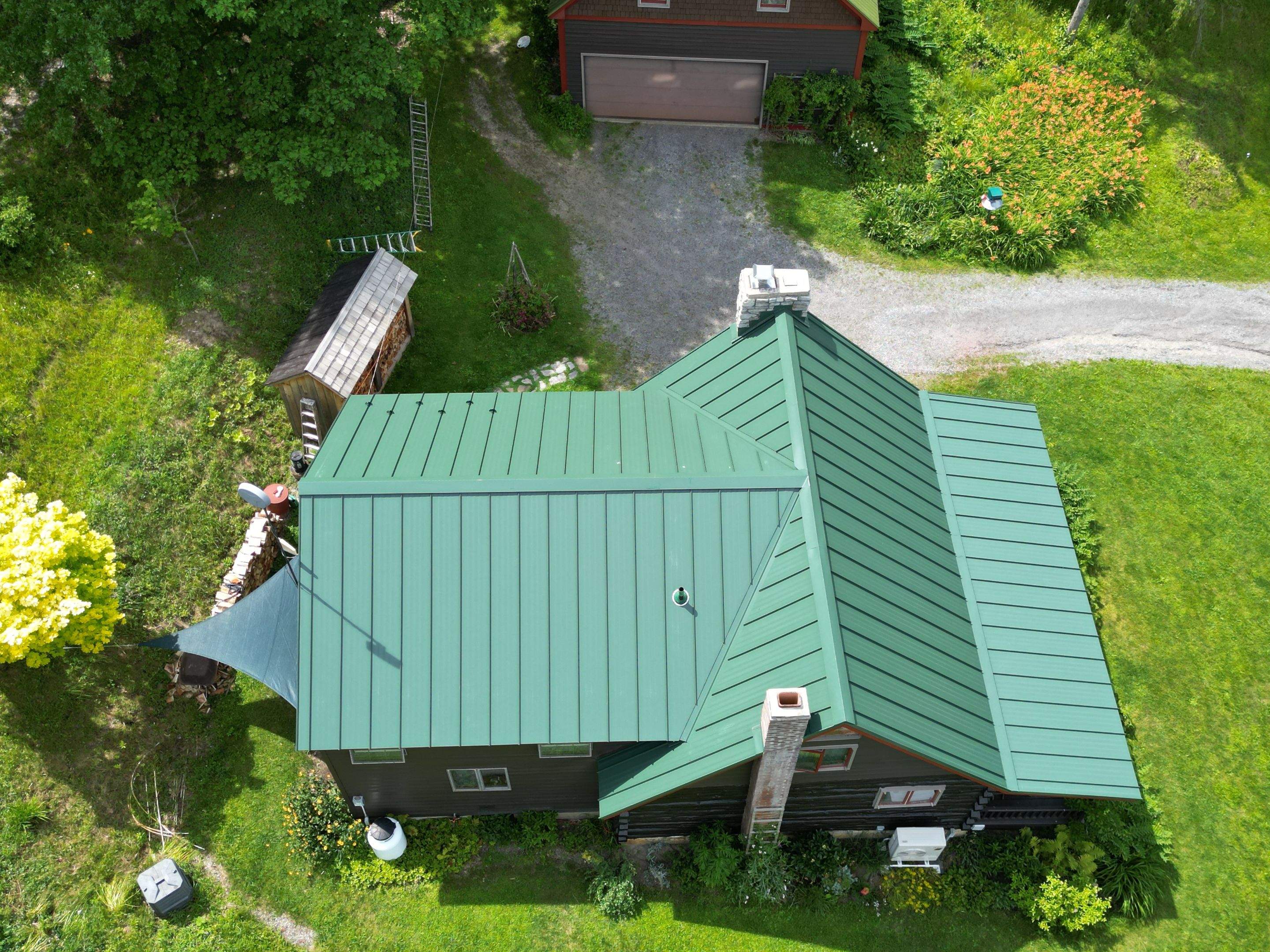 Residential Roofing Installation using Standing Seam  by Goldspire