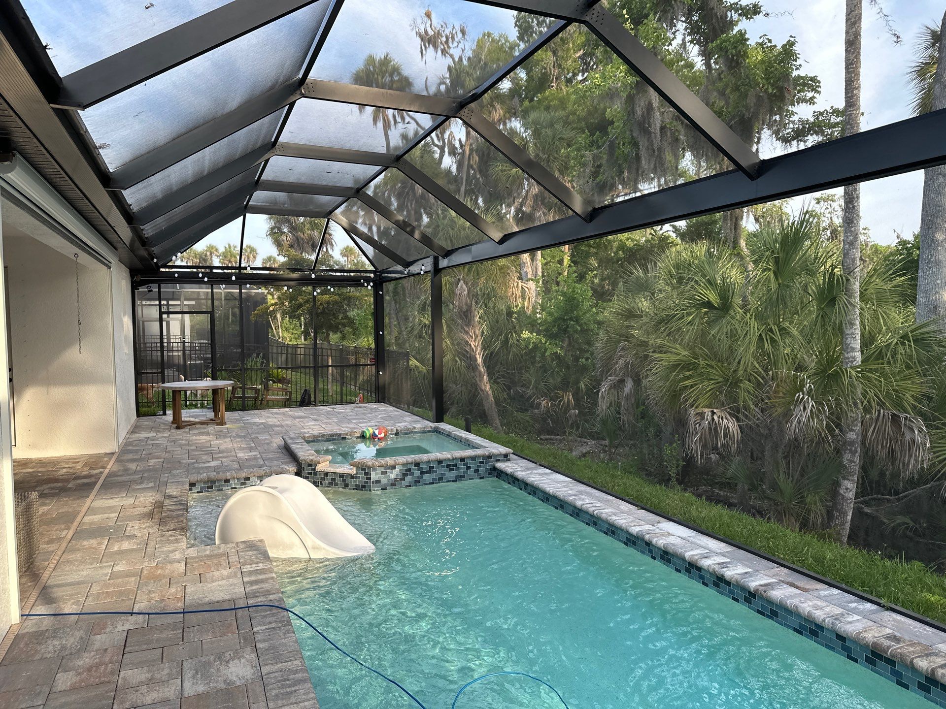 Screen Enclosure & Paver Pool Deck Cleaning in Trevesta Community, Palmetto, FL | Sunshine AquaWash by Sunshine AquaWash