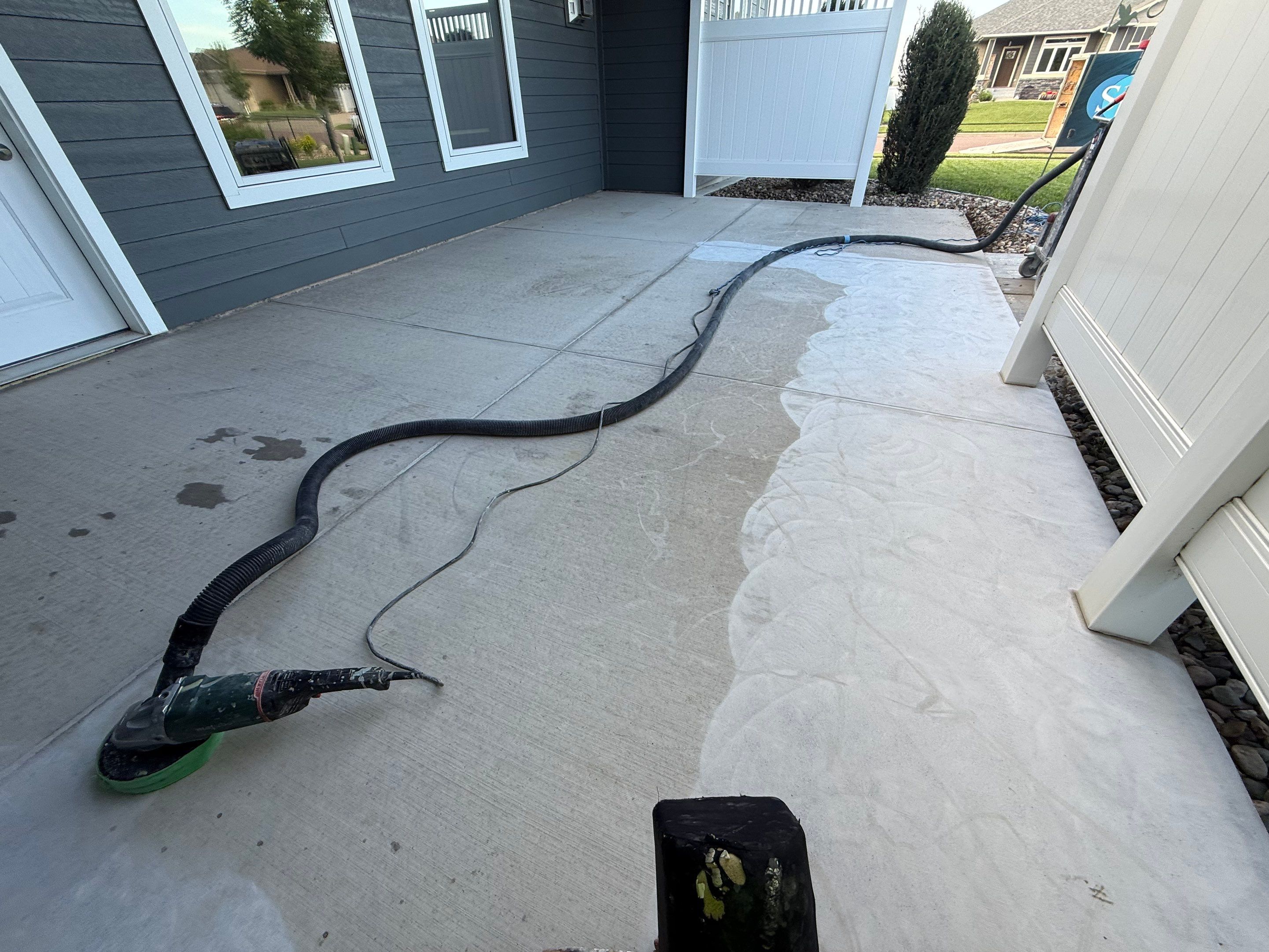 Polyurea Patio Floor Coating in Starry Evening for Sioux Falls Home by Select Painting, Coatings & Garage Cabinets