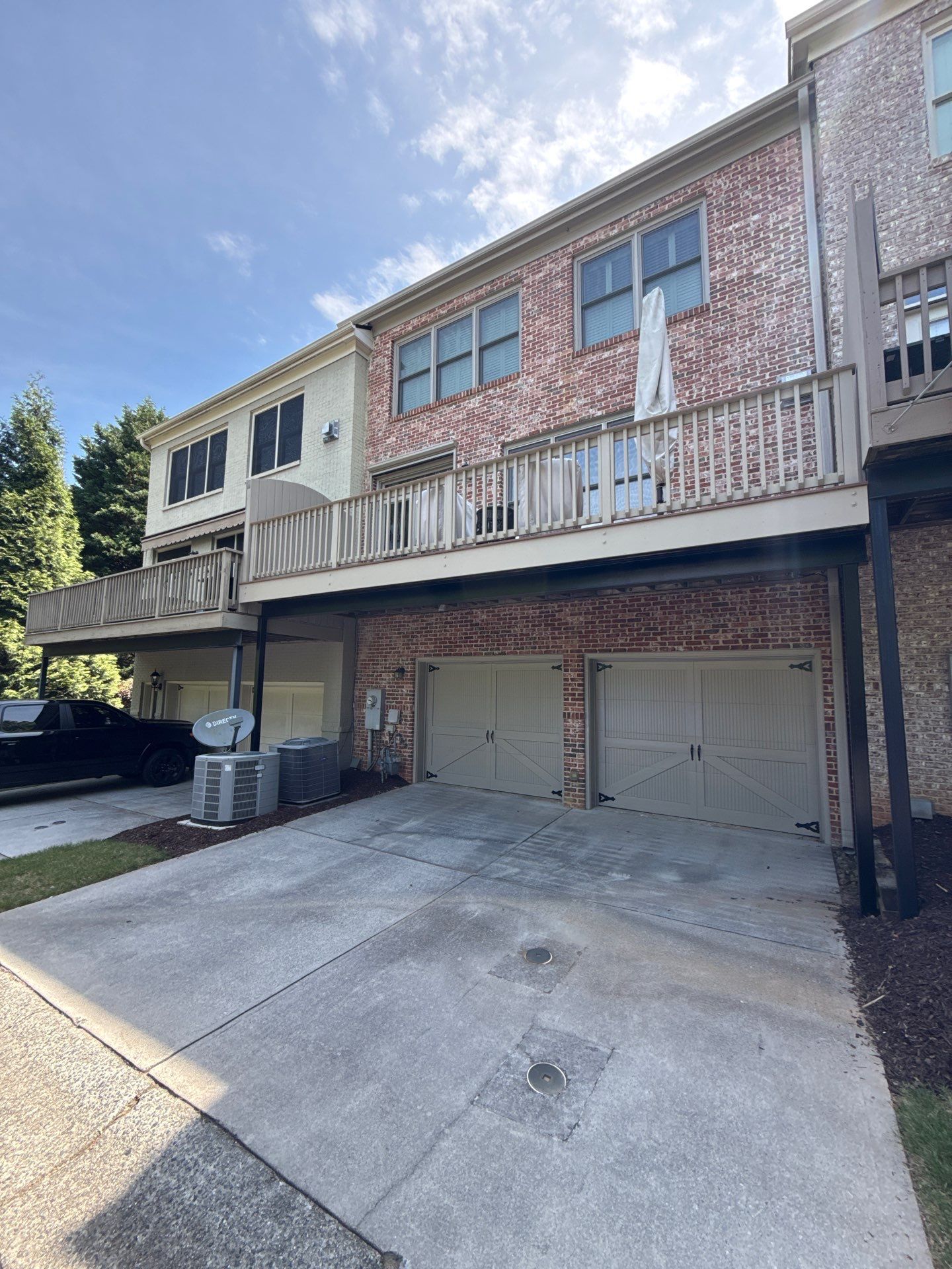 Exterior Trim and Garage Door Painting for Smyrna Townhouse by Swift Home Renovations
