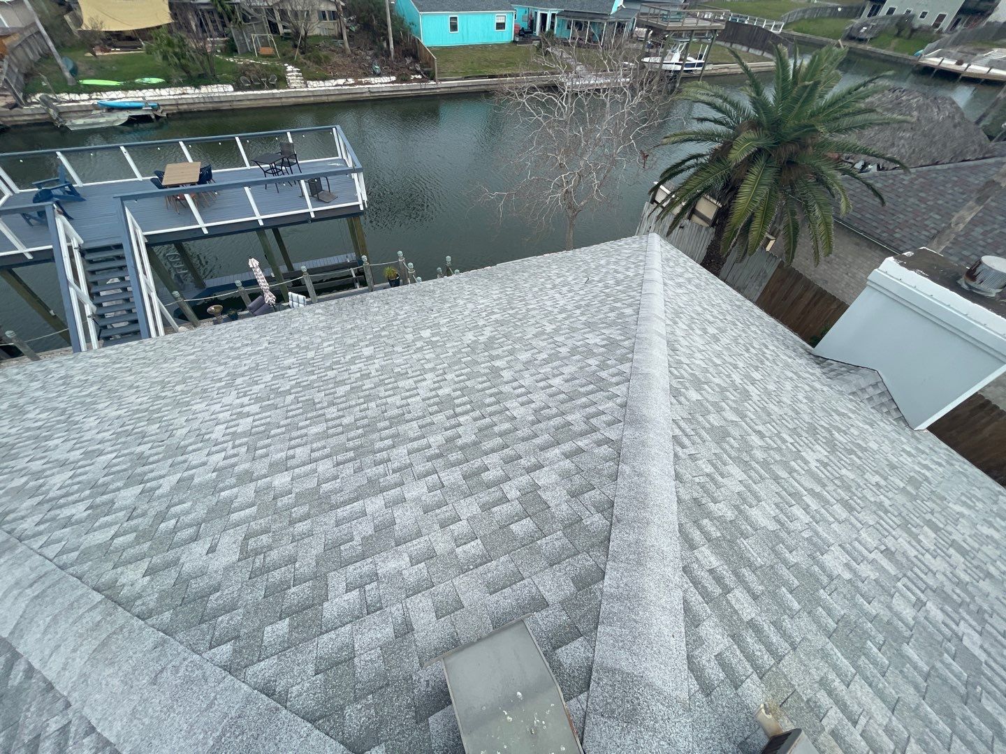 Residential Roofing Repair using Galvanized Chimney Cap & Chase by Lighthouse Roofing