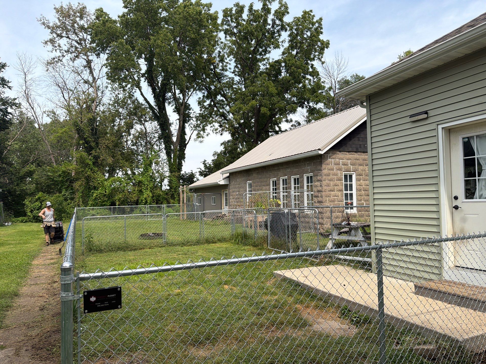 Galvanized Chain Link Fence and Gate Installation in La Porte City by Perfect Picket Fence and Stain