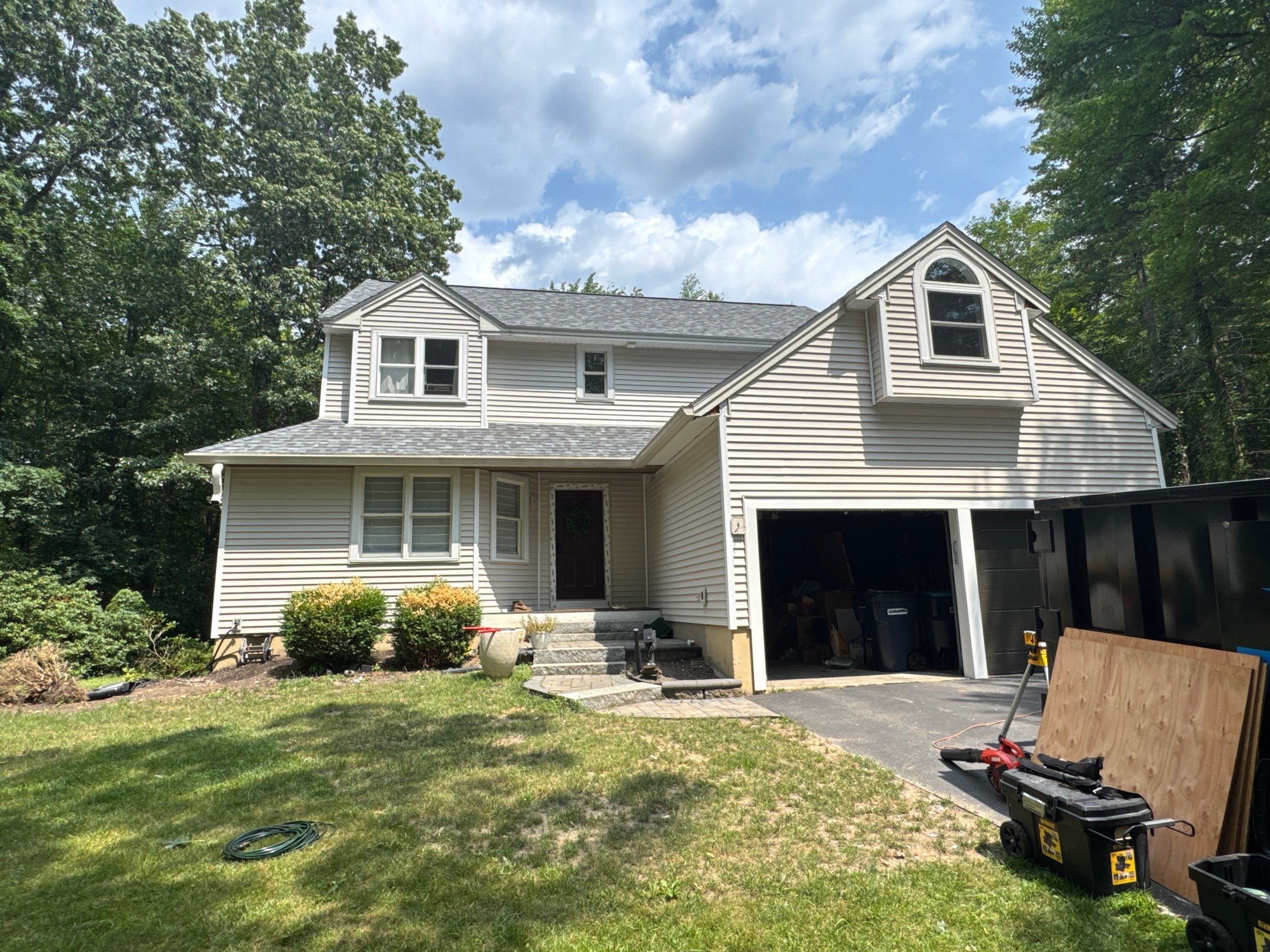 Complete Exterior Remodel in Stratham, NH Near Turnberry Road with Roofing, Siding, Windows, Gutters, and PVC Trim by Compass exteriors