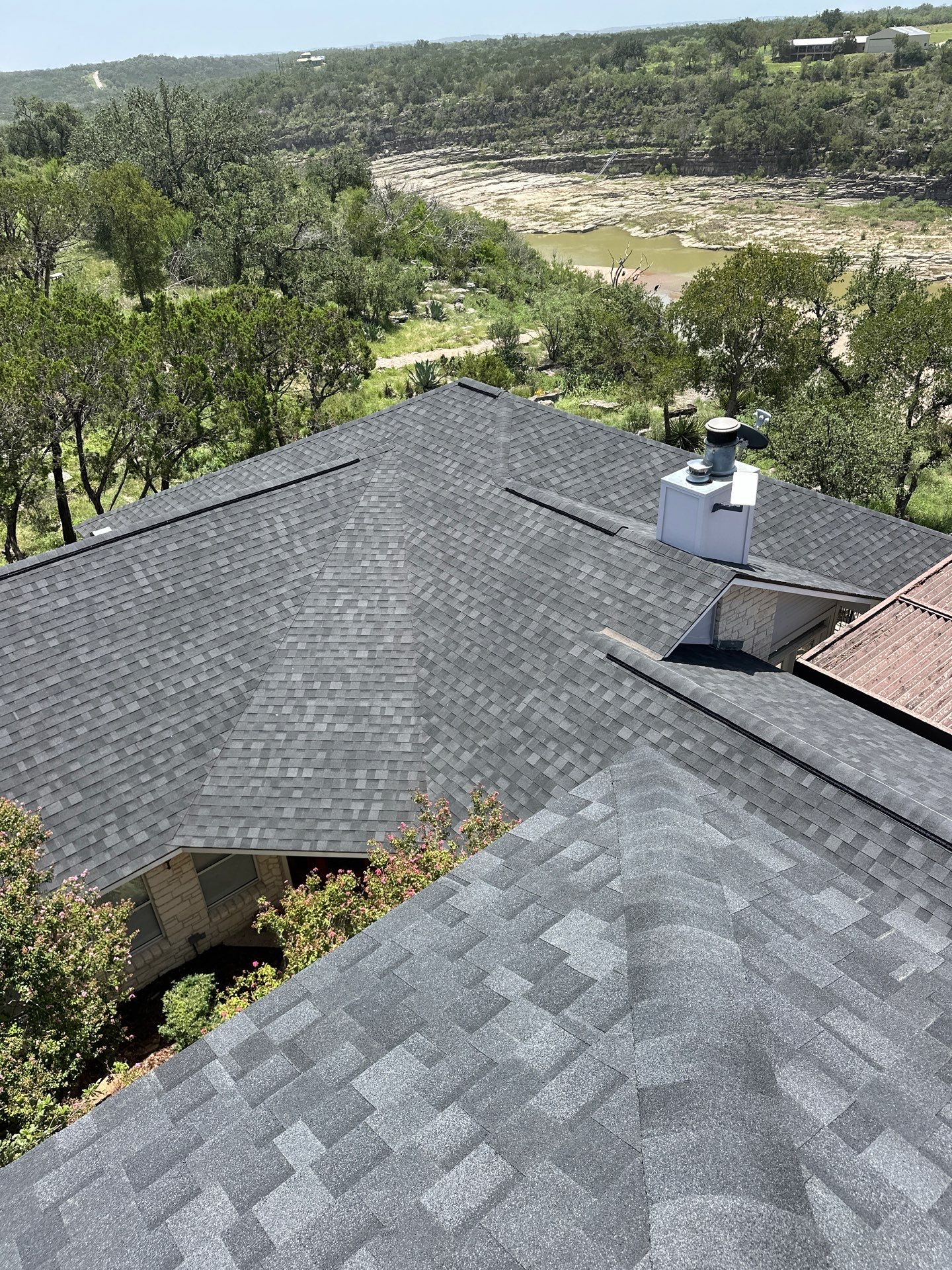 Residential Roofing Installation using IKO Nordic Granite Black by DeZign Roofing & Exteriors