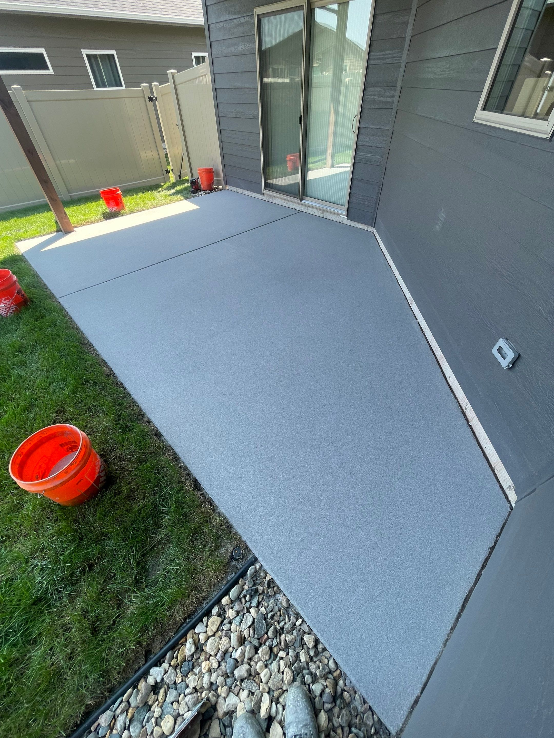 Sioux Falls Residential Concrete Patio and Walkway Coating by Select Painting, Coatings & Garage Cabinets
