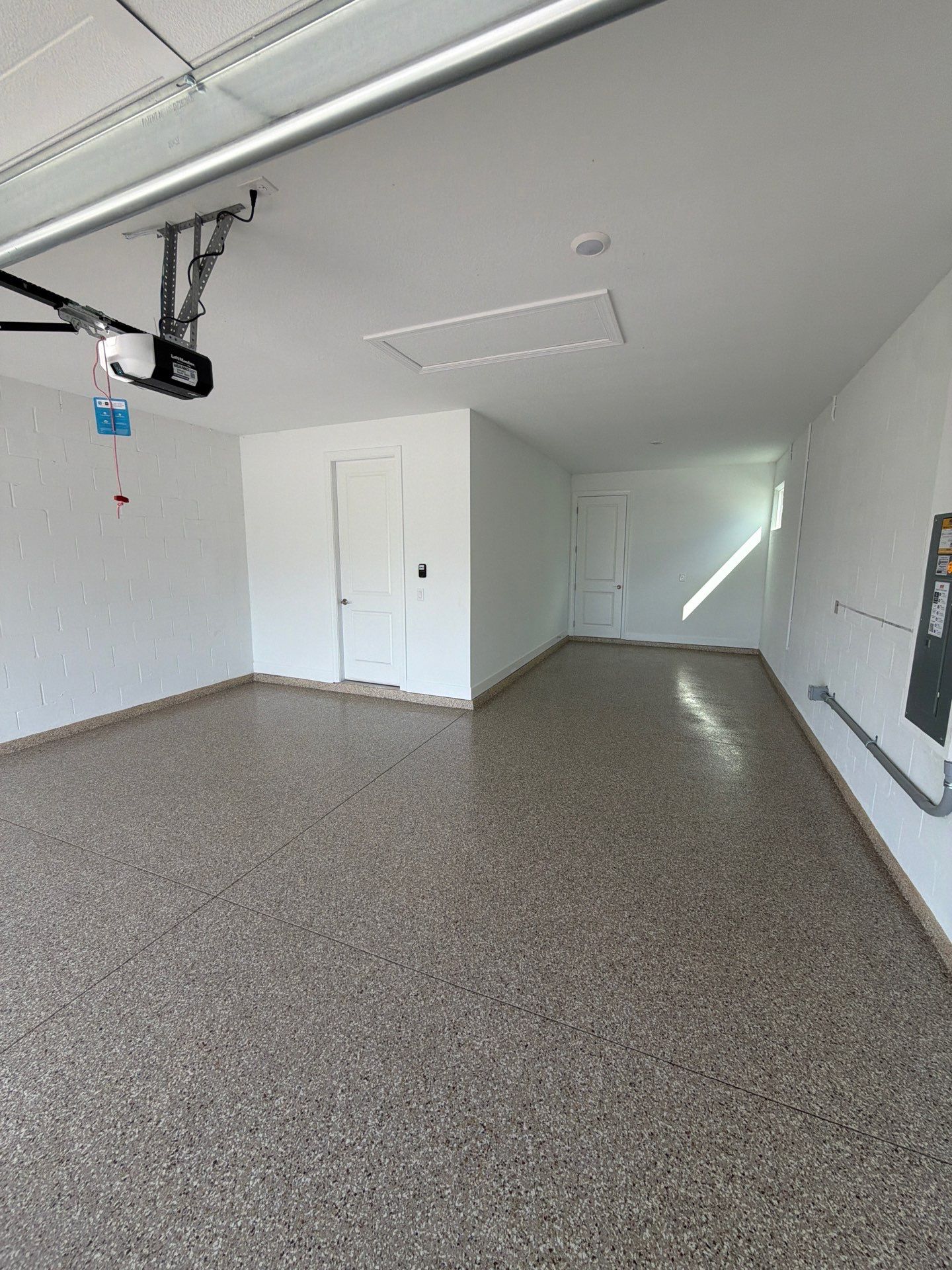 Custom Epoxy Floor Coating for Wesley Chapel Garage by Performance Floors & Coating