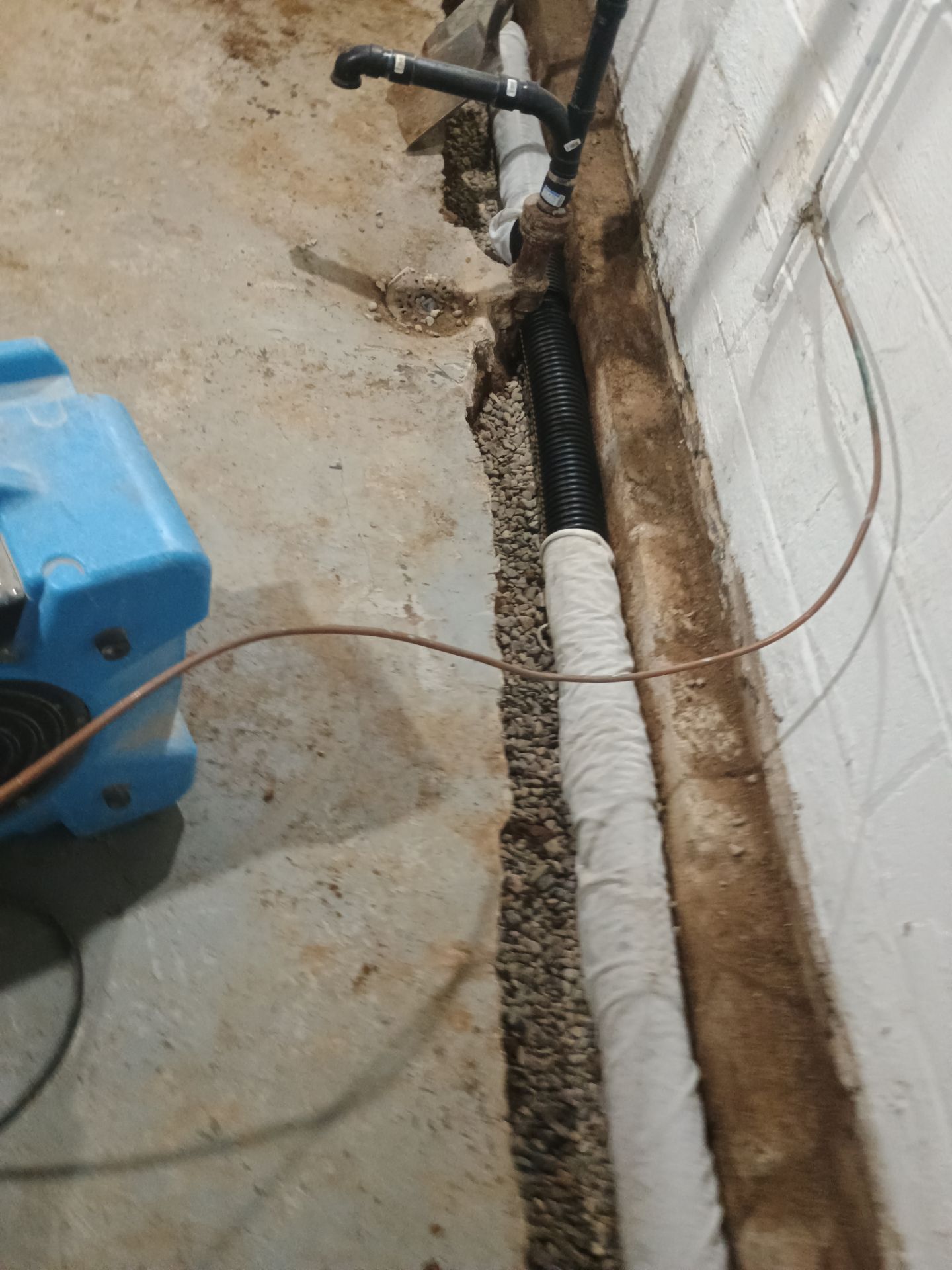 Interior Drain Tile & Yard French Drain in St. Paul, MN by Waterproofing Northeast