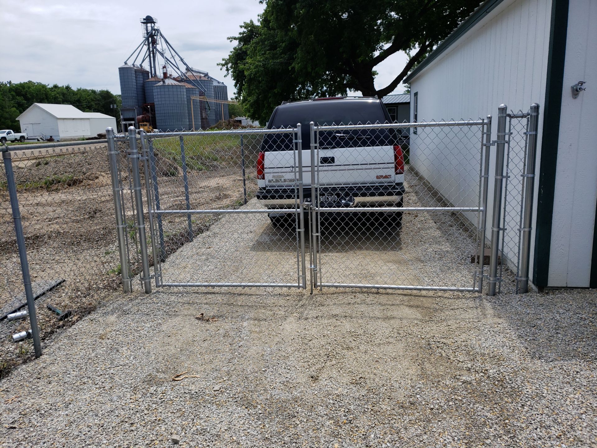 Residential Chain Link Fence and Gate Installation in Washburn by Perfect Picket Fence and Stain