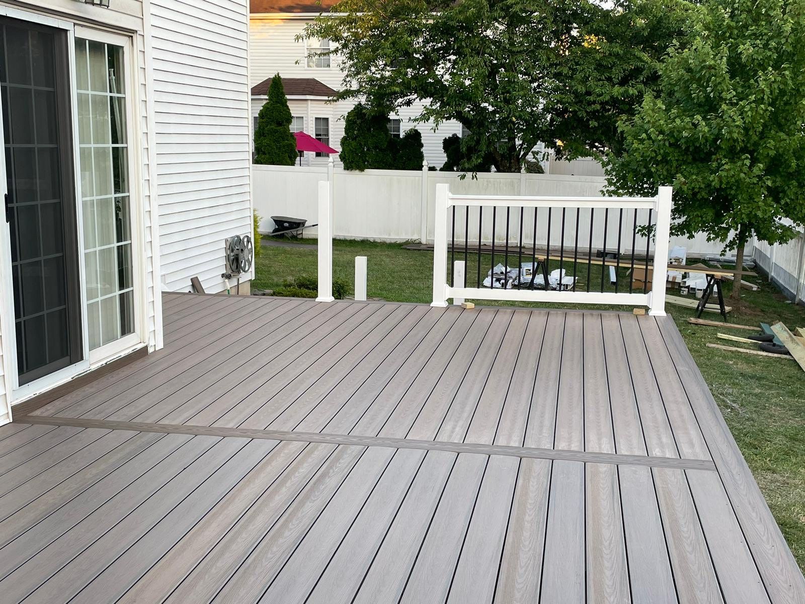 New Deck with Pergola and Vinyl Lattice by deck guardian
