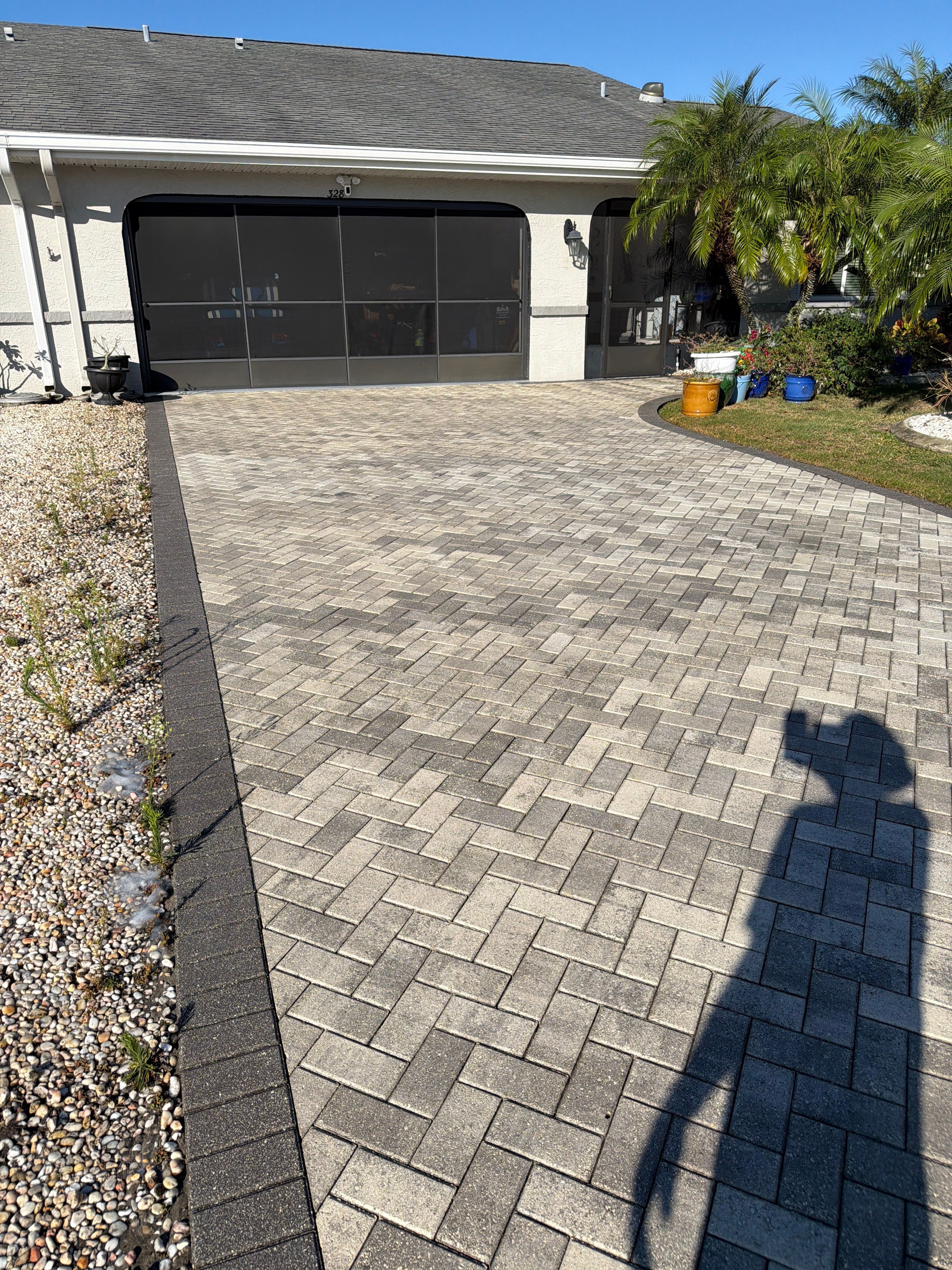 Paver Sealing and Cleaning for Herringbone Driveway in Sun City Center by Supreme Paver Experts