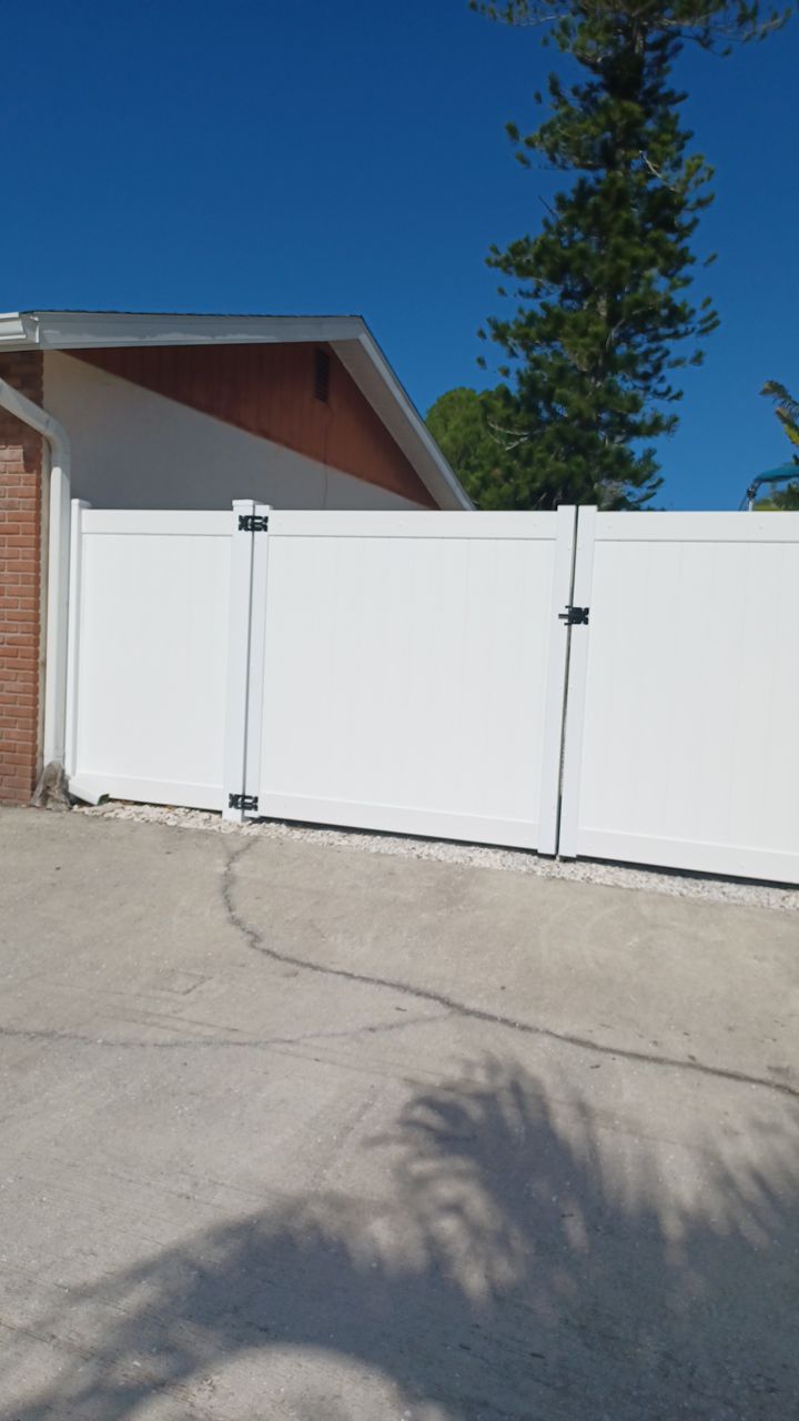 Bradenton, FL 6ft. Tall White Vinyl Privacy & Board on Board Wood Fence by Asap fence and gates, LLC