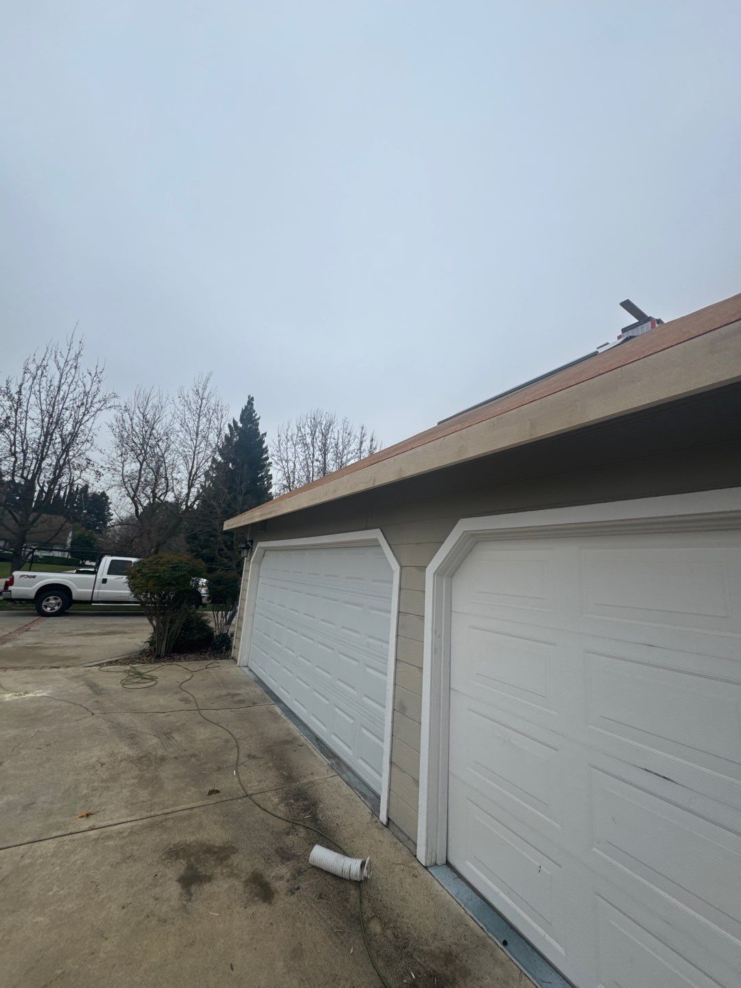 New shingles and gutters using GAF Timberline HDZ shingles and aluminum gutter by Straight Edge Roofing Inc