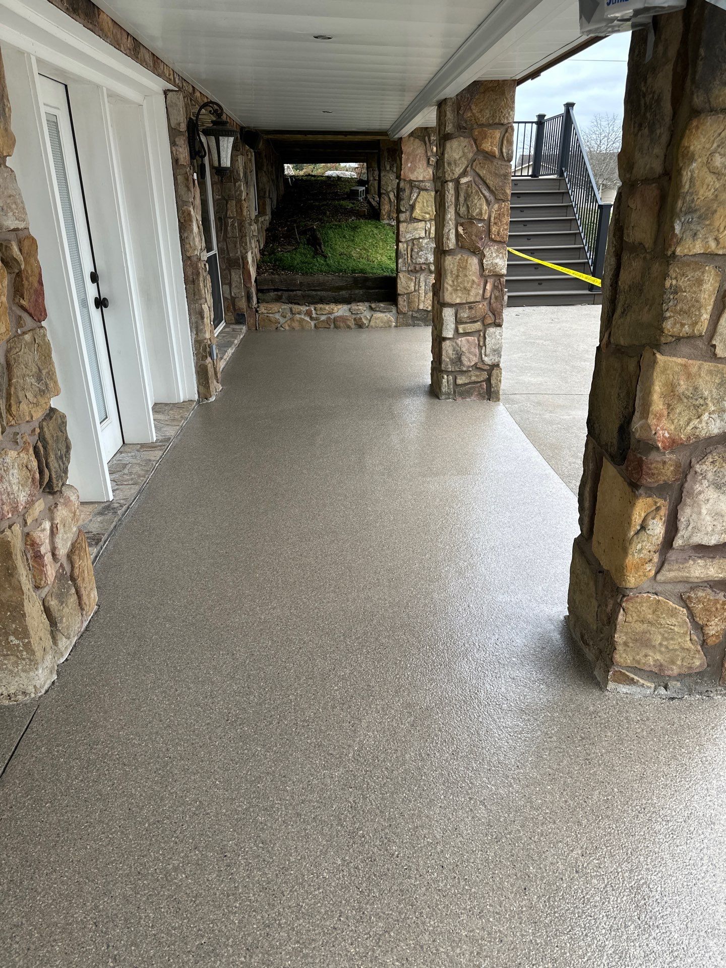 Back Patio using Obsidian by Elite Floor Solutions