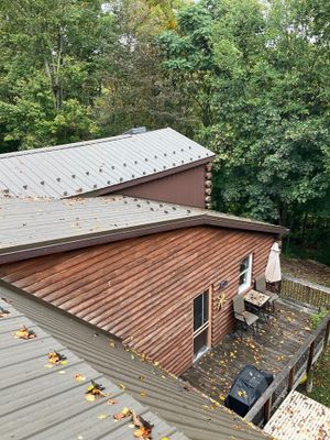 Log Cabin Standing Seam Metal Roof and Skylight Replacement