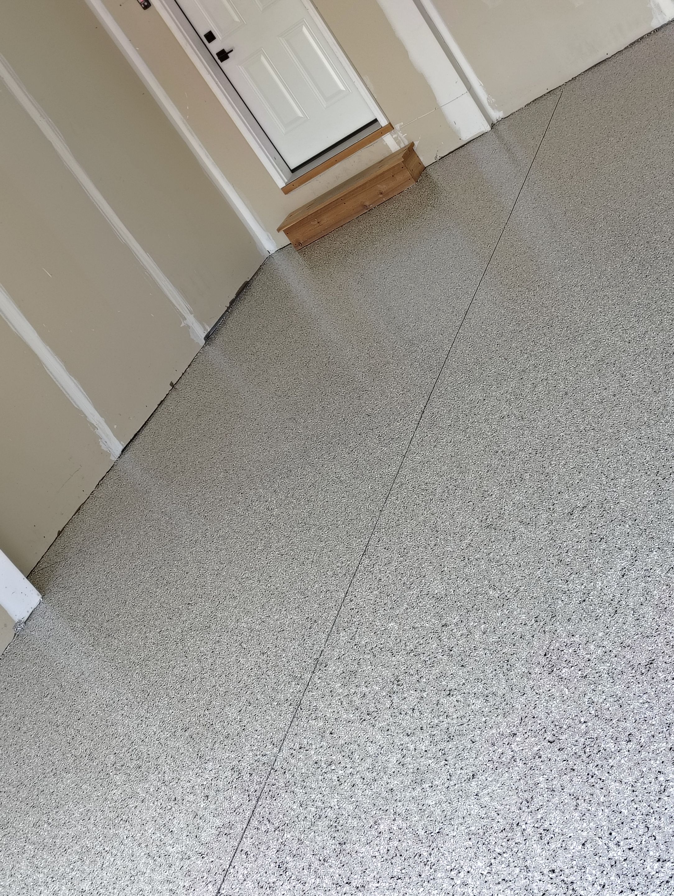 Epoxy Garage Floor Coating with Decorative Flake in Harrisburg by Select Painting, Coatings & Garage Cabinets