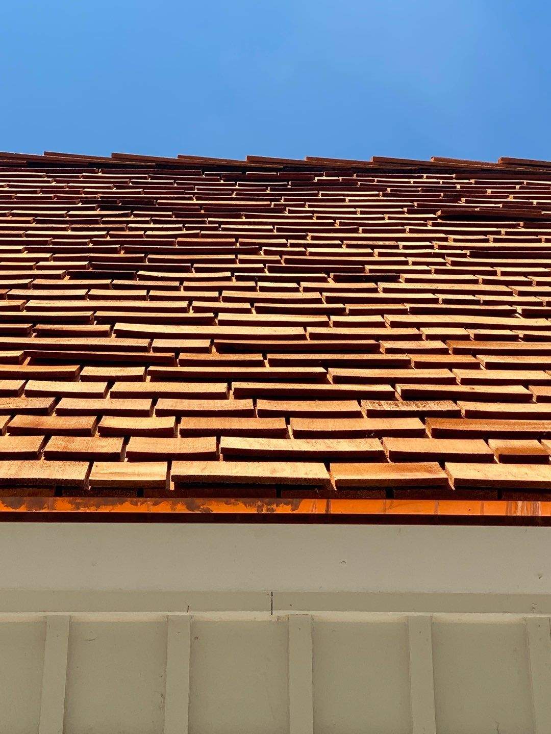 Cedar Shake Roof Replacement with Half Round Gutter Installation by Custom Installations