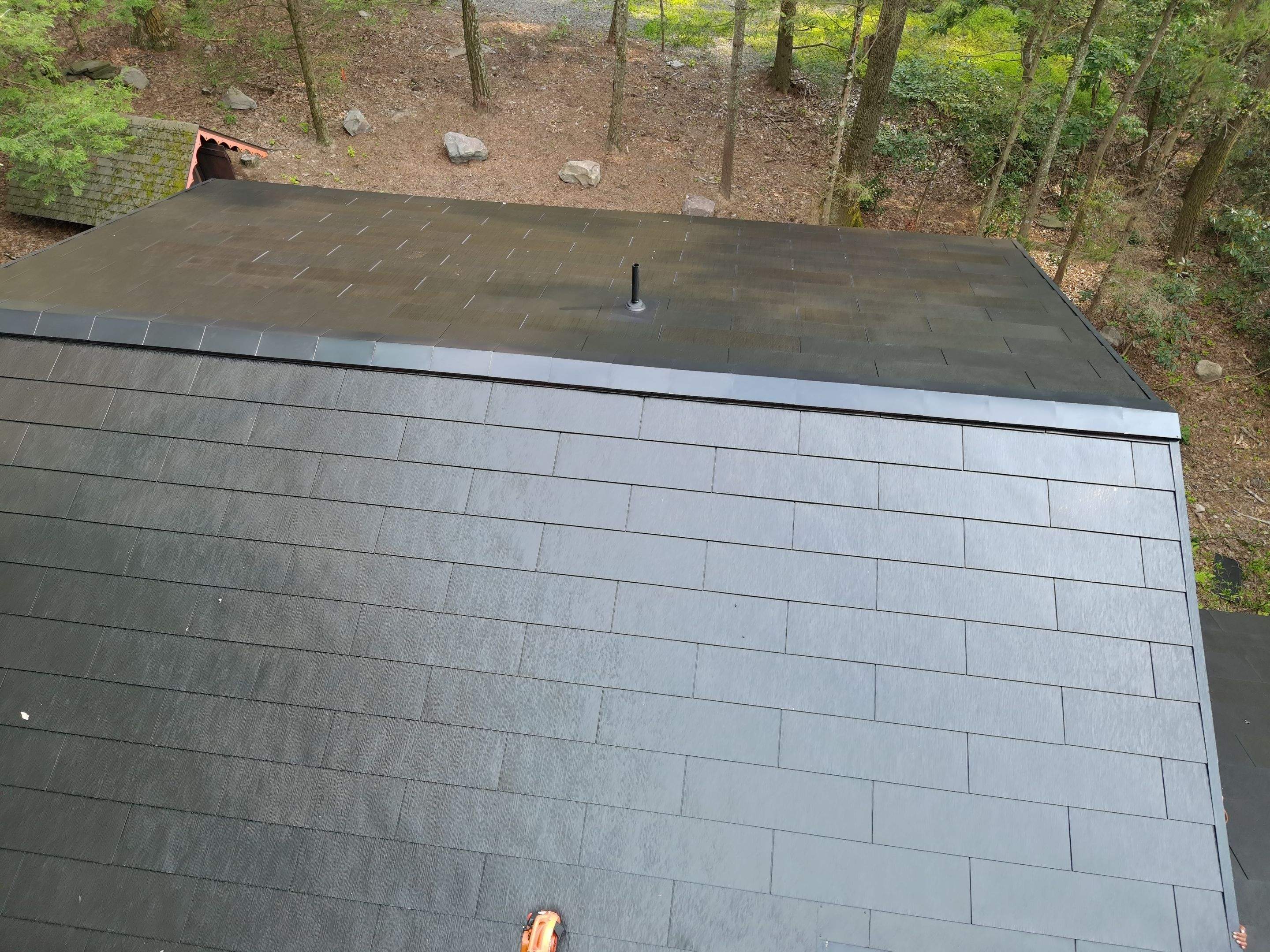 Stunning Tesla Solar Roof Cabin in the Woods by American Home Contractors