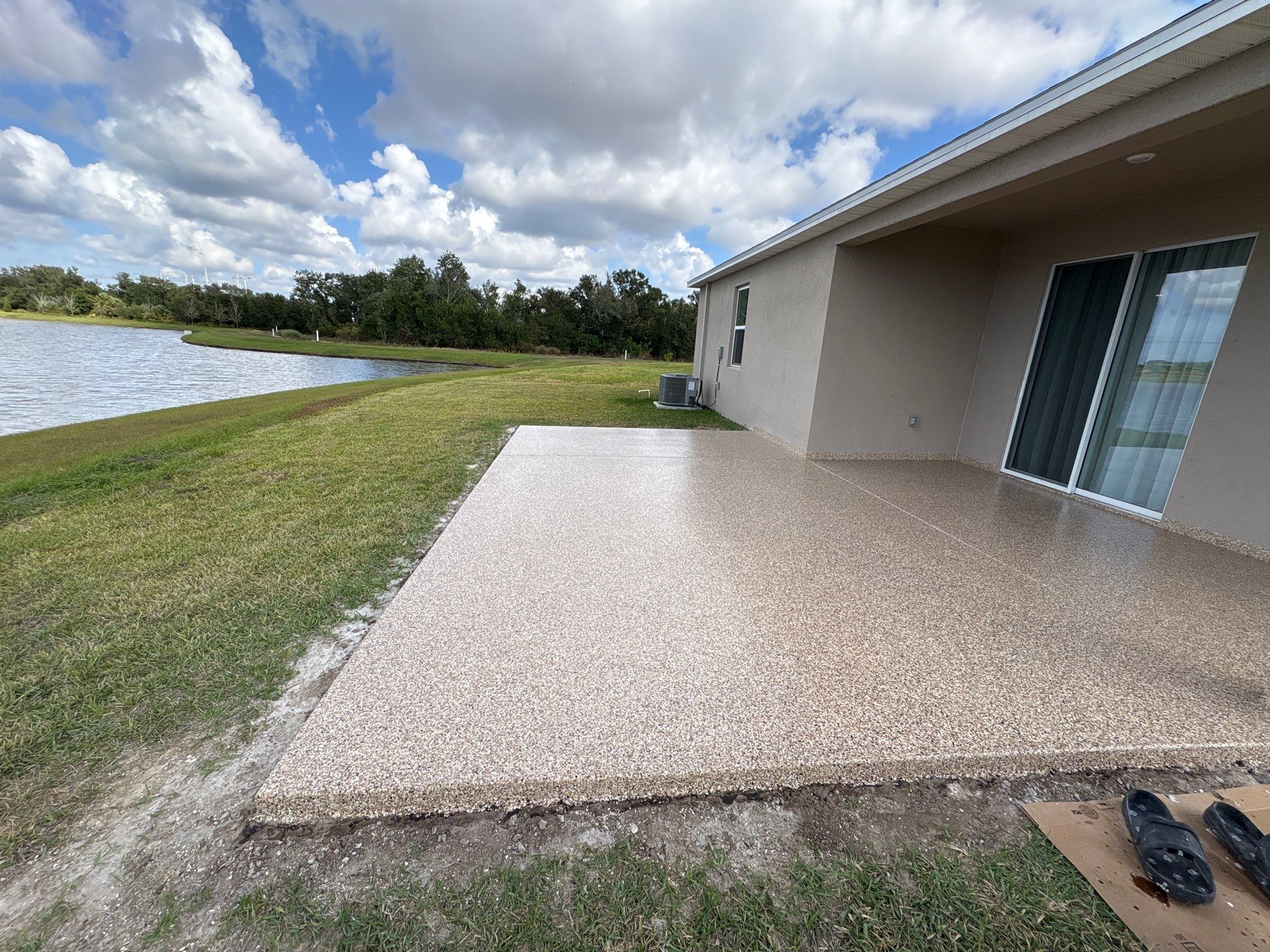 Outdoor Living Upgrade: 'Outback' Flake System for a Premium Patio Finish by Performance Floors & Coating