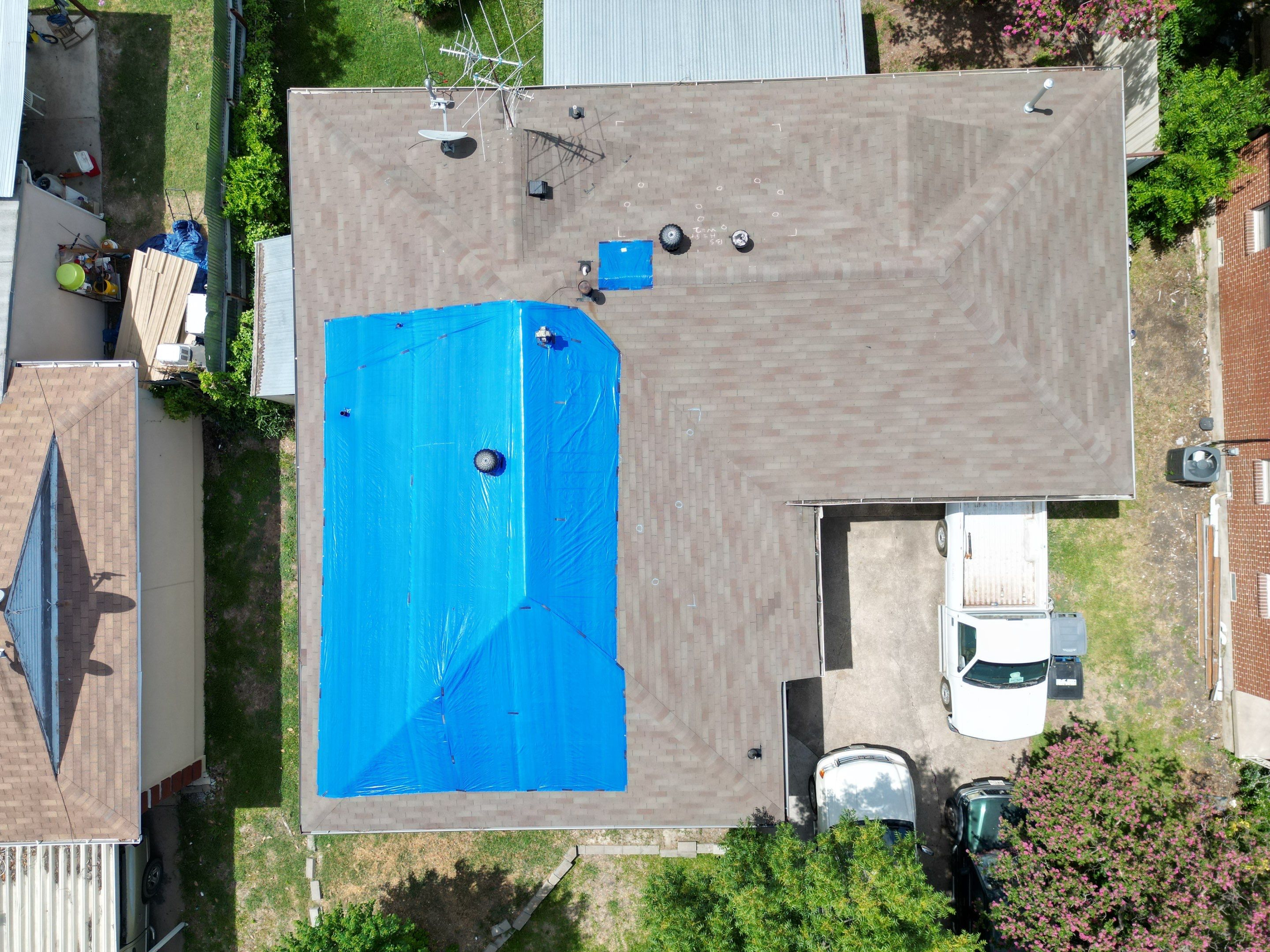 Tarps Dallas  using TARP BLUE by V General Contractors 