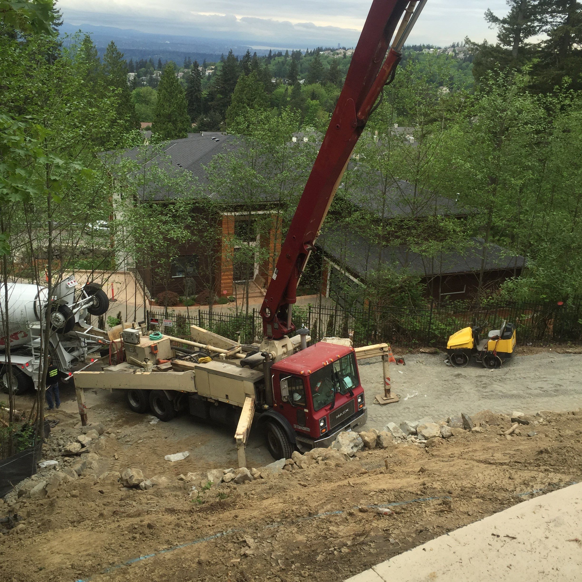 Asphalt Driveway and Stamped Concrete Patio Finish  by Jireh Asphalt & Concrete Inc 