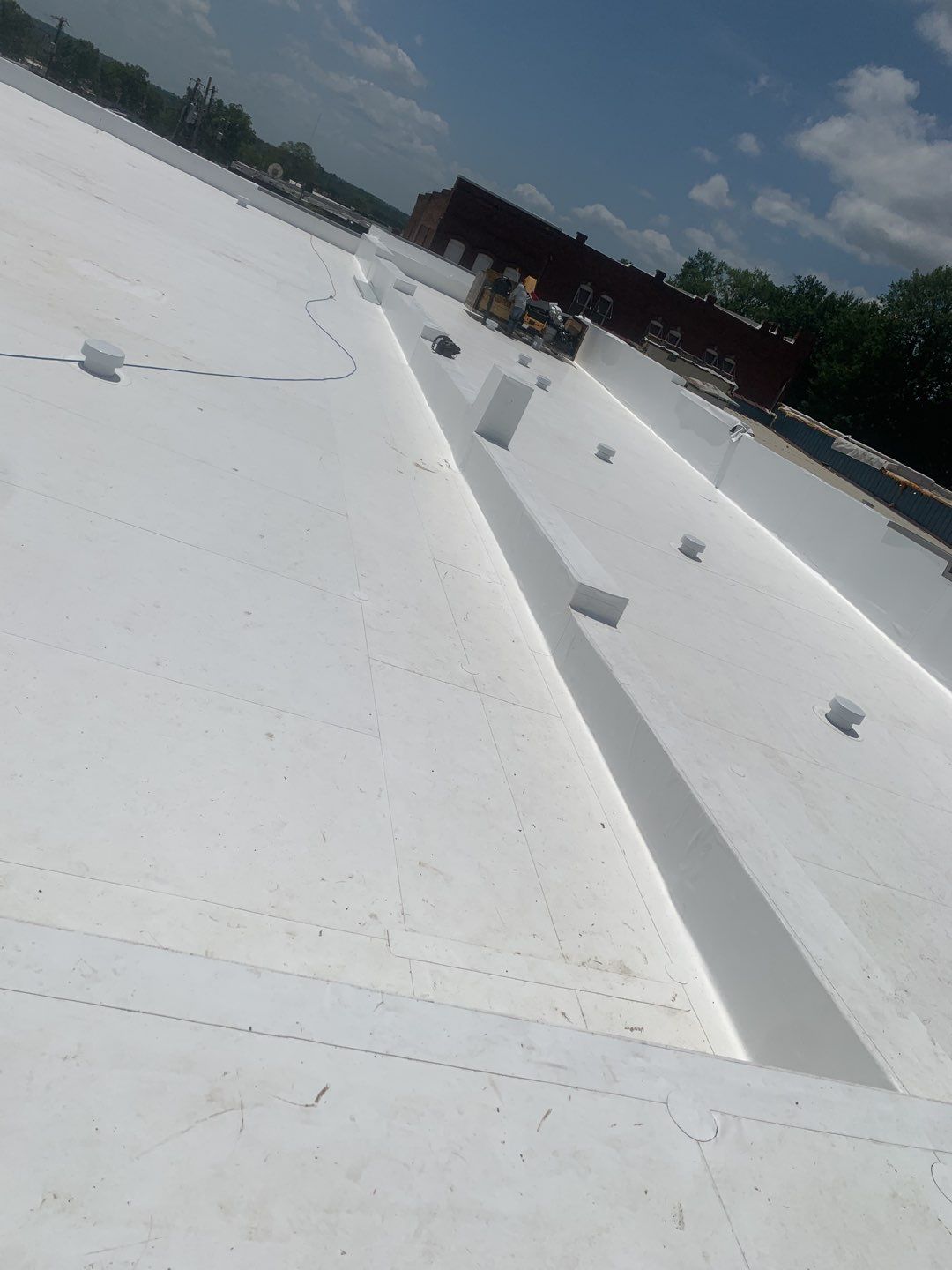 Commercial Roofing Installation in DeQueen, AR, using 50 mil PVC by Hostetler Roofing
