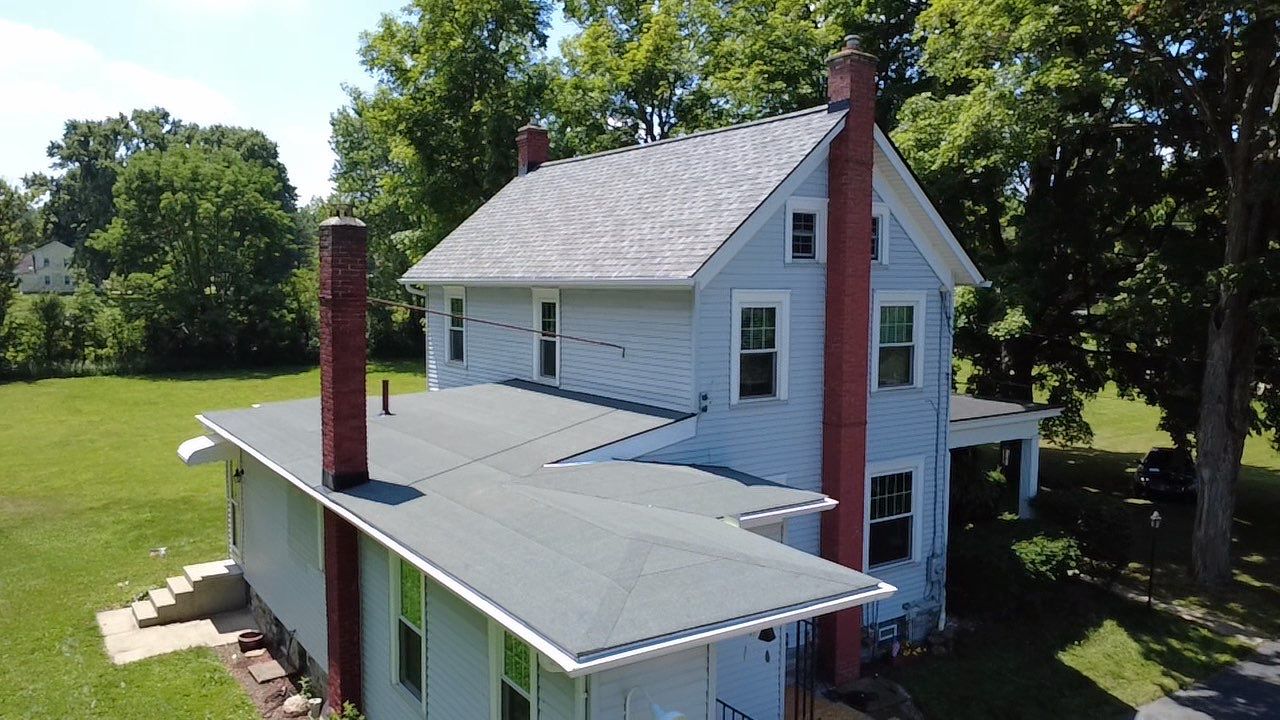 Complete Residential Shingle and Membrane Roof Installation in Salem by Eagle Eye Roofing