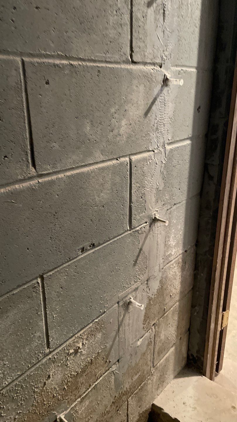 Interior Drain Tile & Sump Pump System in West Minneapolis by Waterproofing Northeast