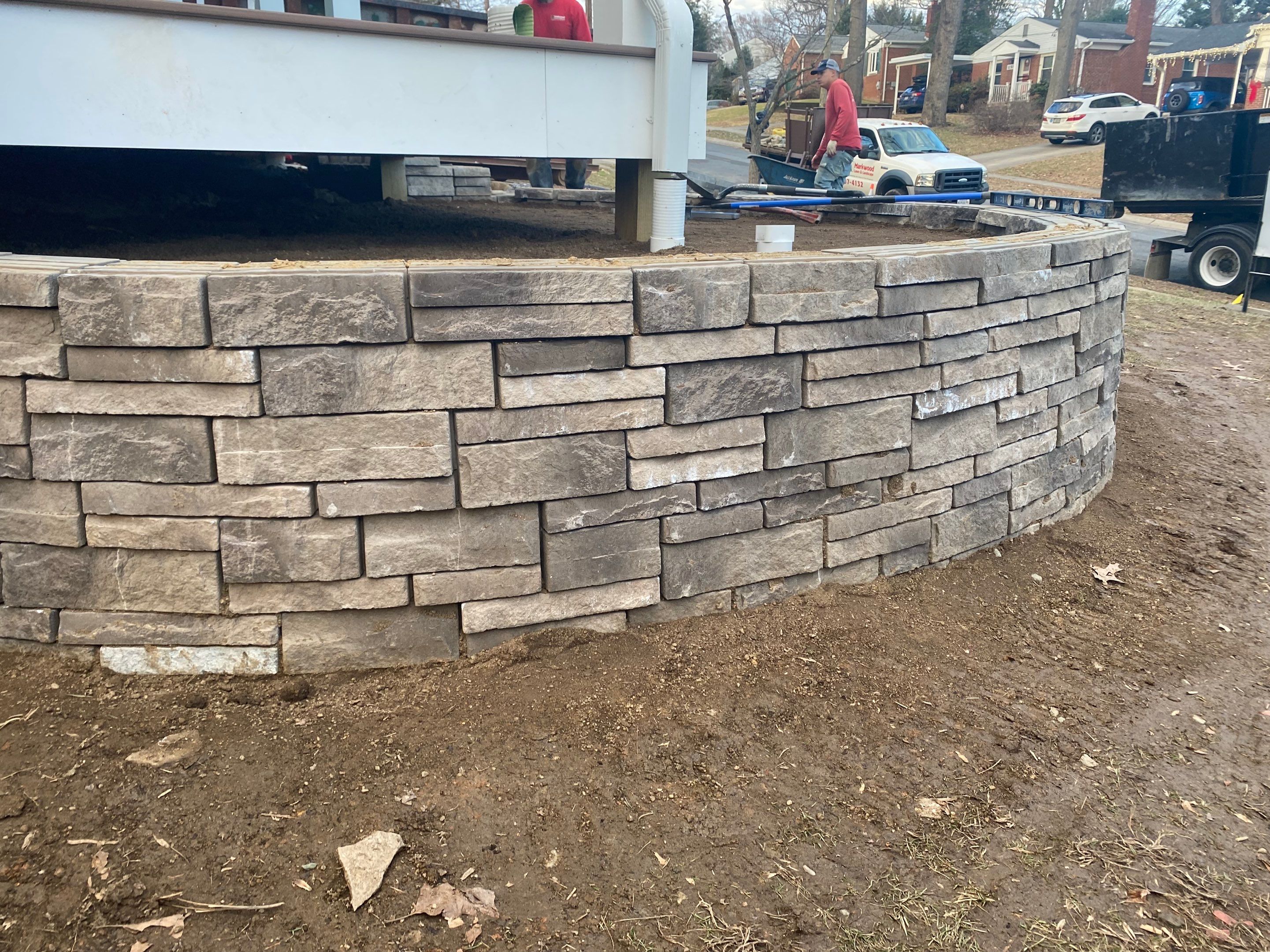 Retaining wall, walkway, small patio and landscape install by The Smet Companies, LLC