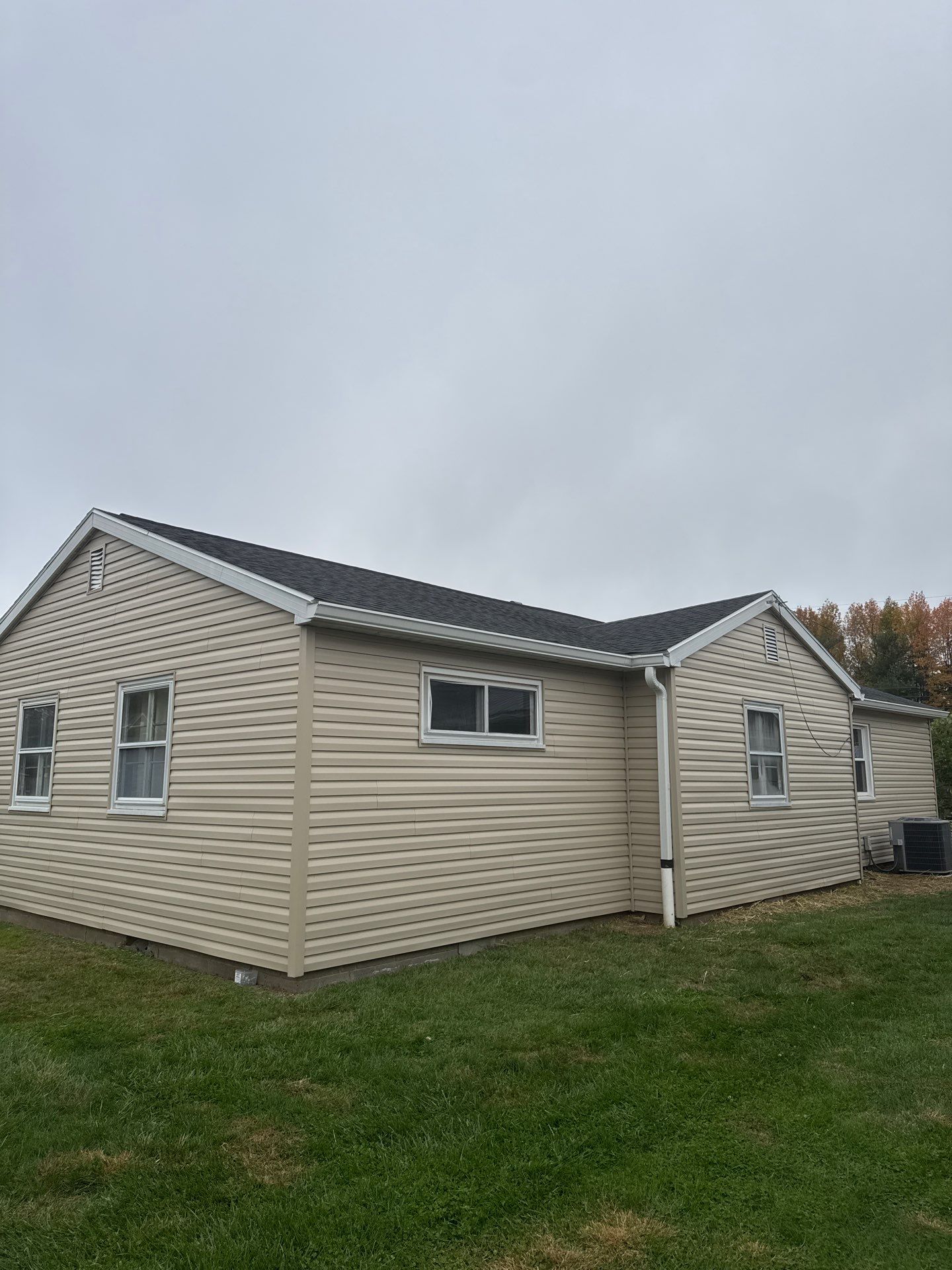 Siding Installation using Vinyl Siding by Rainstoppers Roofing