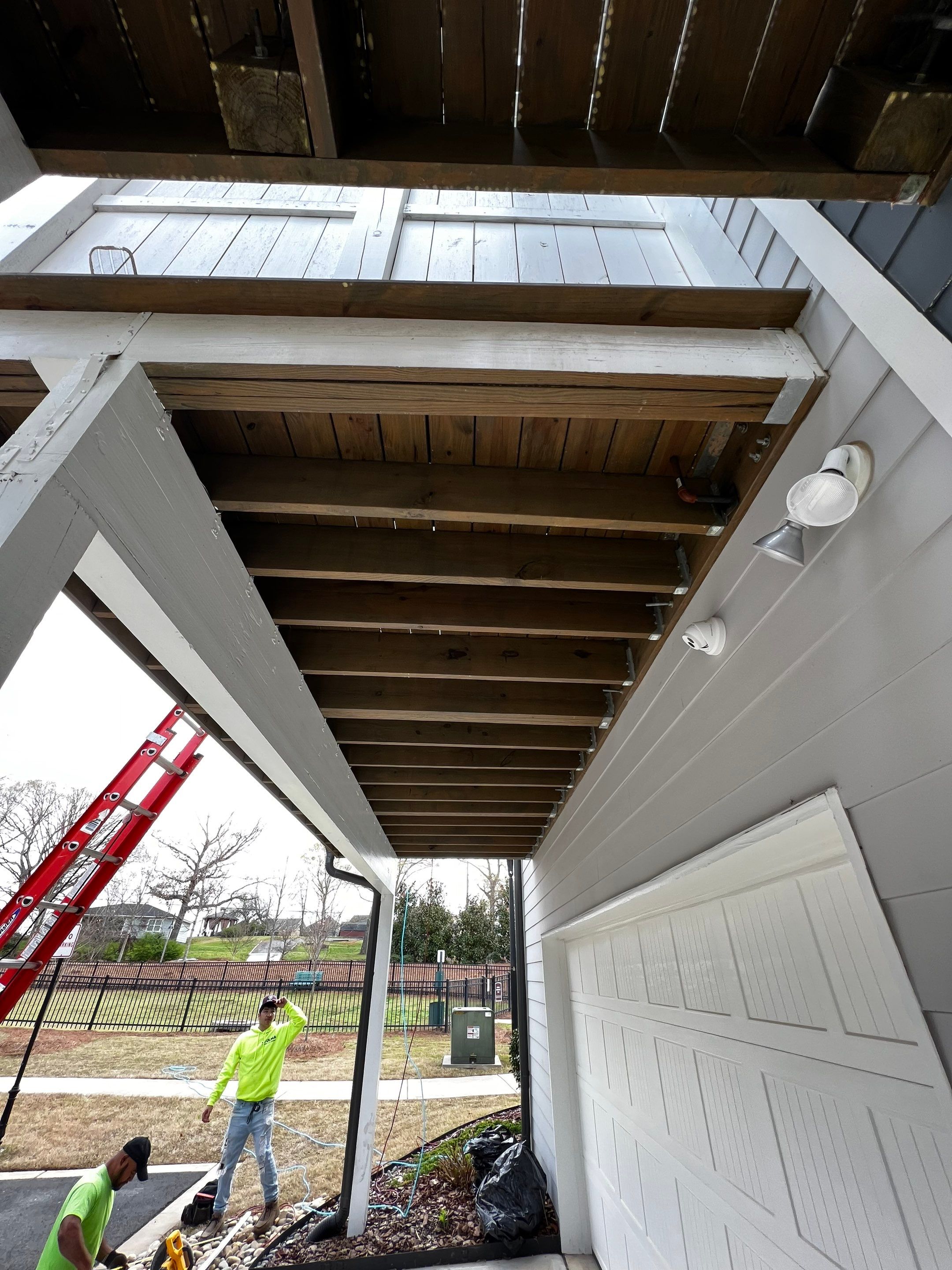 Custom Screened-in Porch Addition Above Garage in Woodstock by Swift Home Renovations