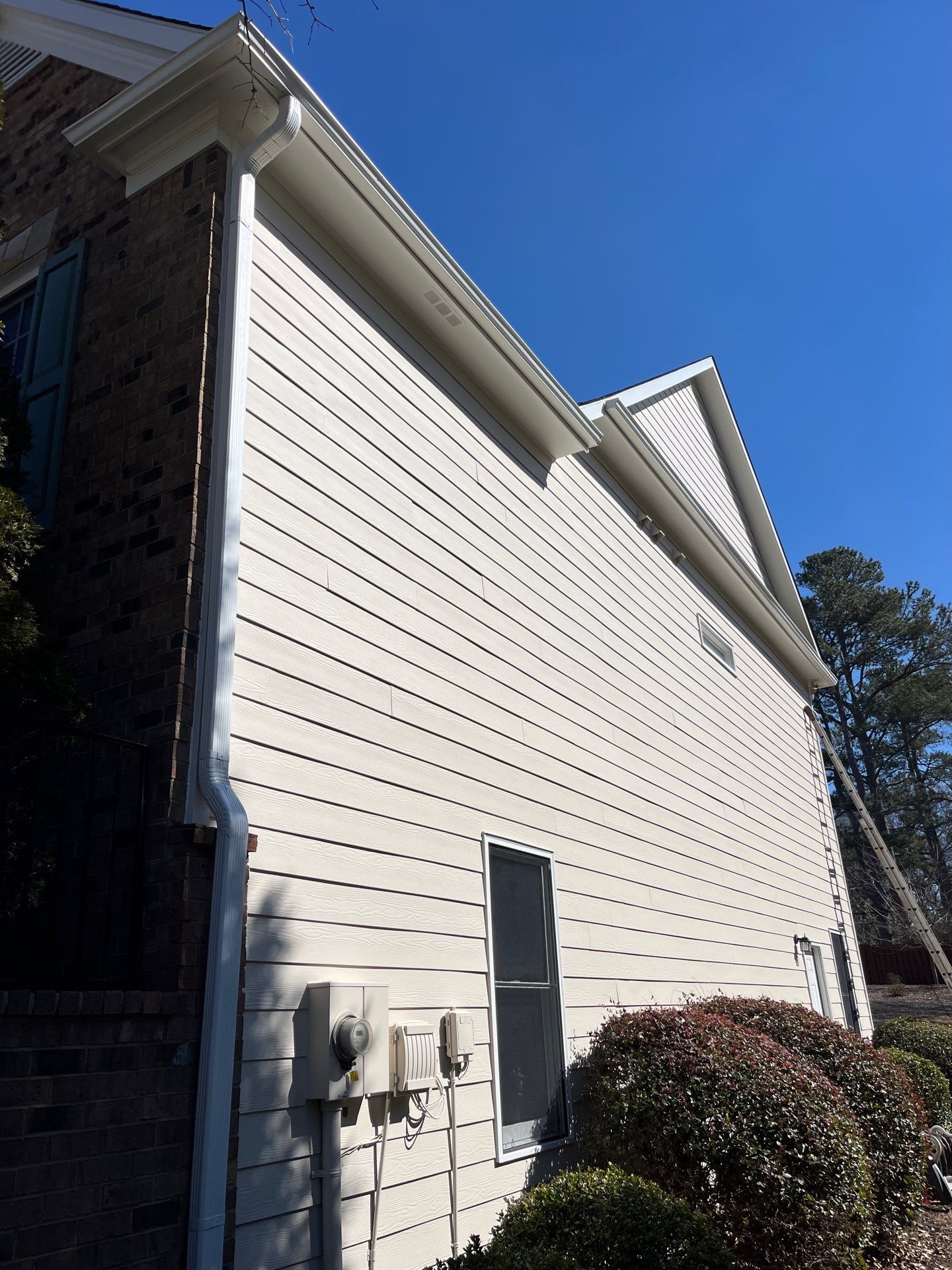 Garage Door and Home Exterior Painting and Rotten Wood Replacement in Marietta, GA by Nelson Exteriors