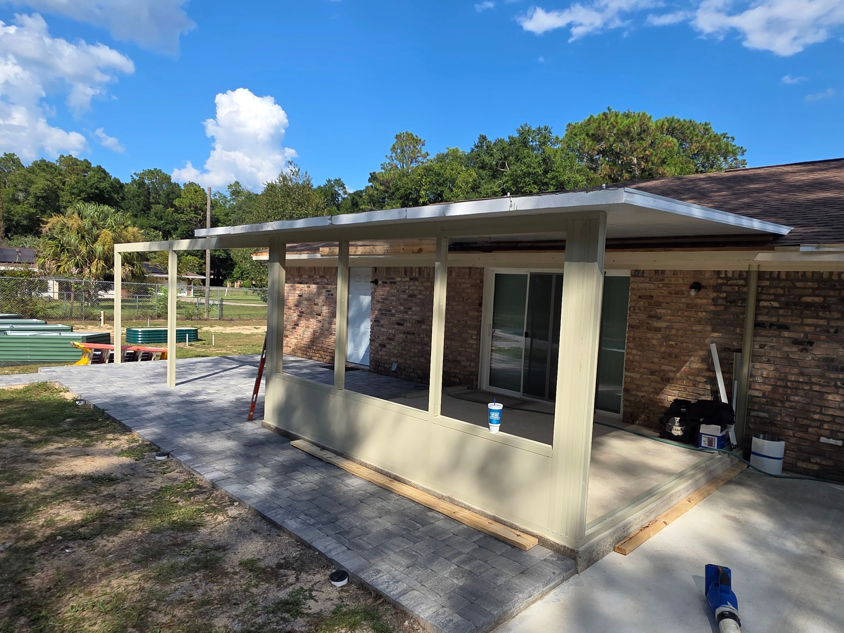 Sunroom Addition and Covered Patio by Titan Sunrooms