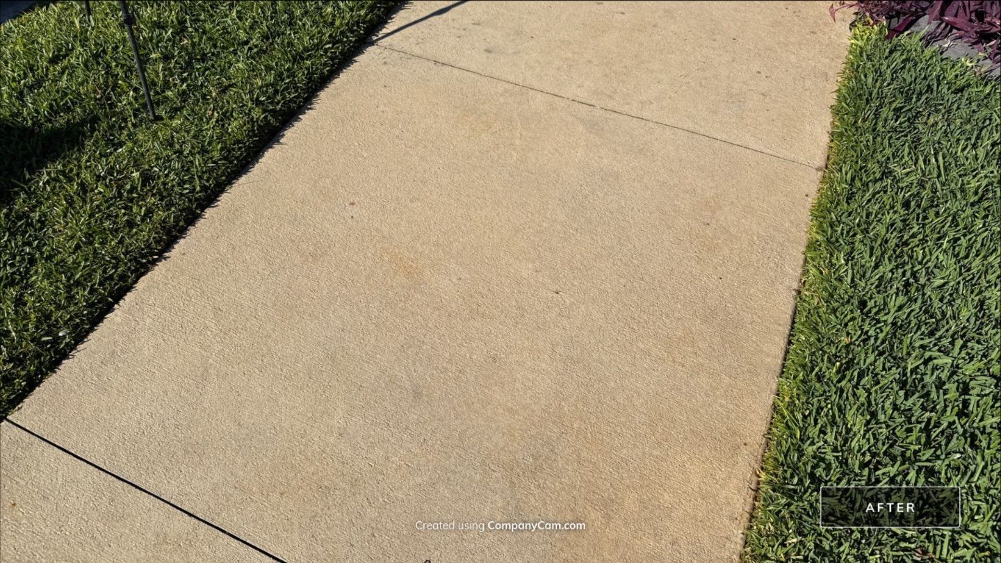Rust Stain Removal from Concrete Driveway and Pavers in Park East at Azario | Lakewood Ranch, FL by Sunshine AquaWash